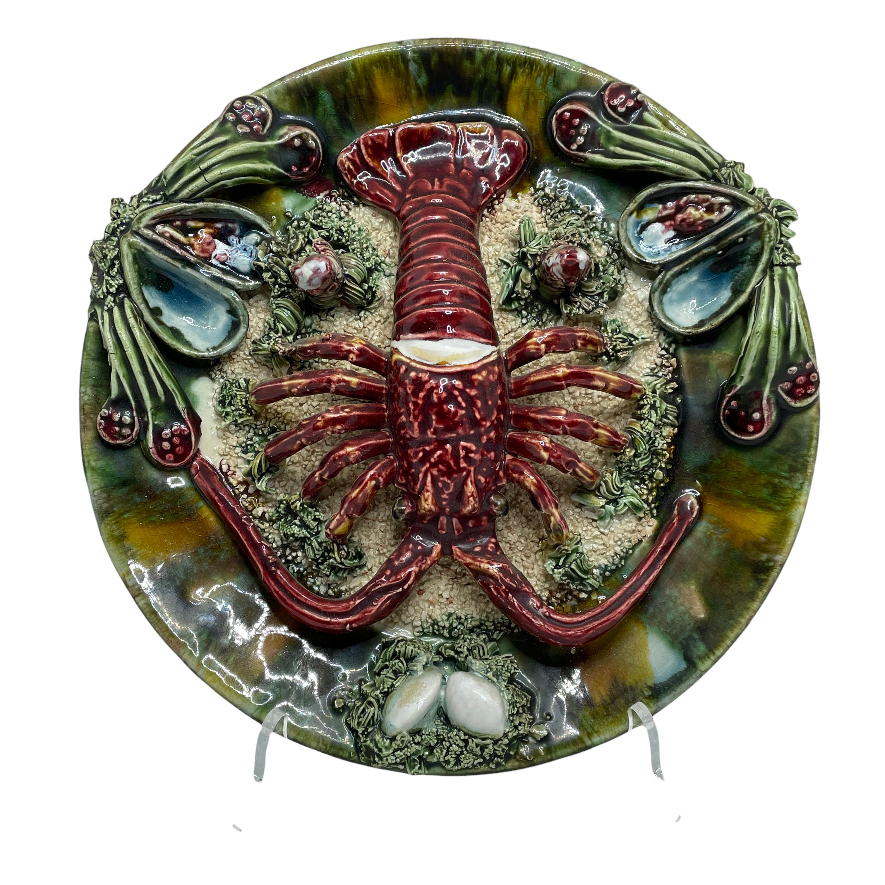 Portugese Caldas da Rainha Palissy lobster wall plaque plate, circa 1950s.
Decorated with mussels, shells and seaweed. Beautiful condition for this age. A beautiful piece of art for any room.