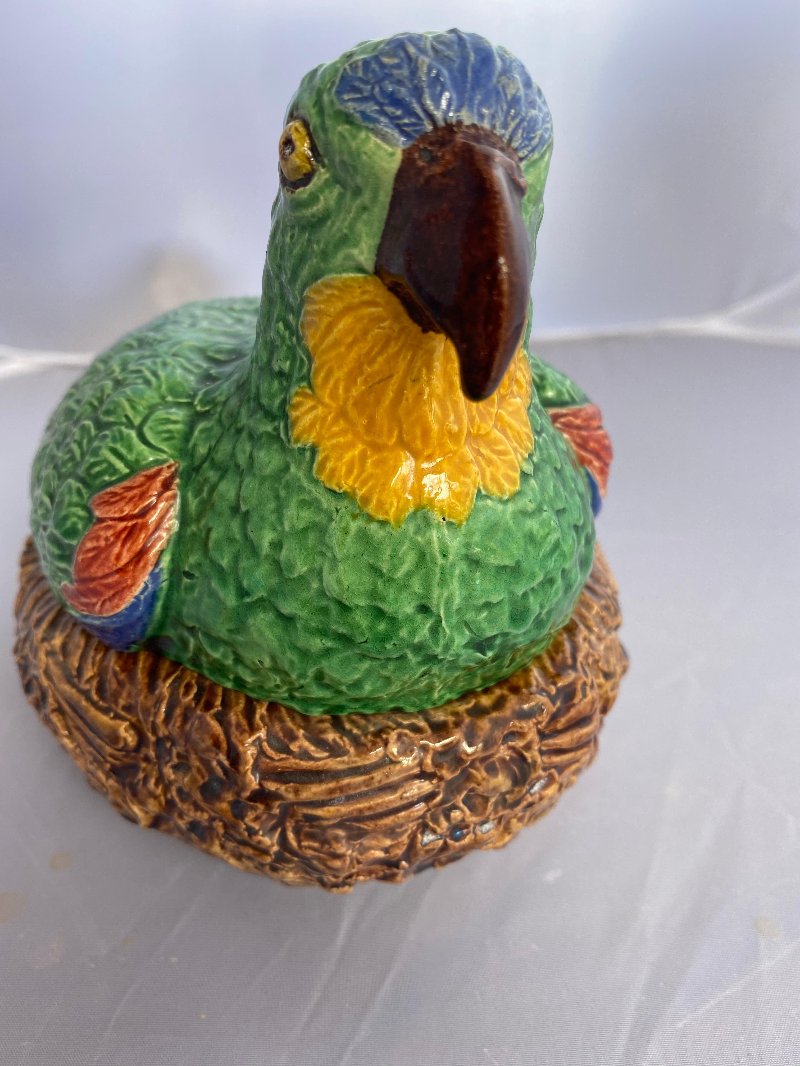 Majolica Palissy Ware Parrot on Nest Lidded Box signed Bordalo Pinheiro, circa 1900.
Rafael Bordalo Pinheiro (Portuguese 1846 - 1905) In 1885, he founded a ceramics factory in Caldas da Rainha, where he created many of the pottery designs for which