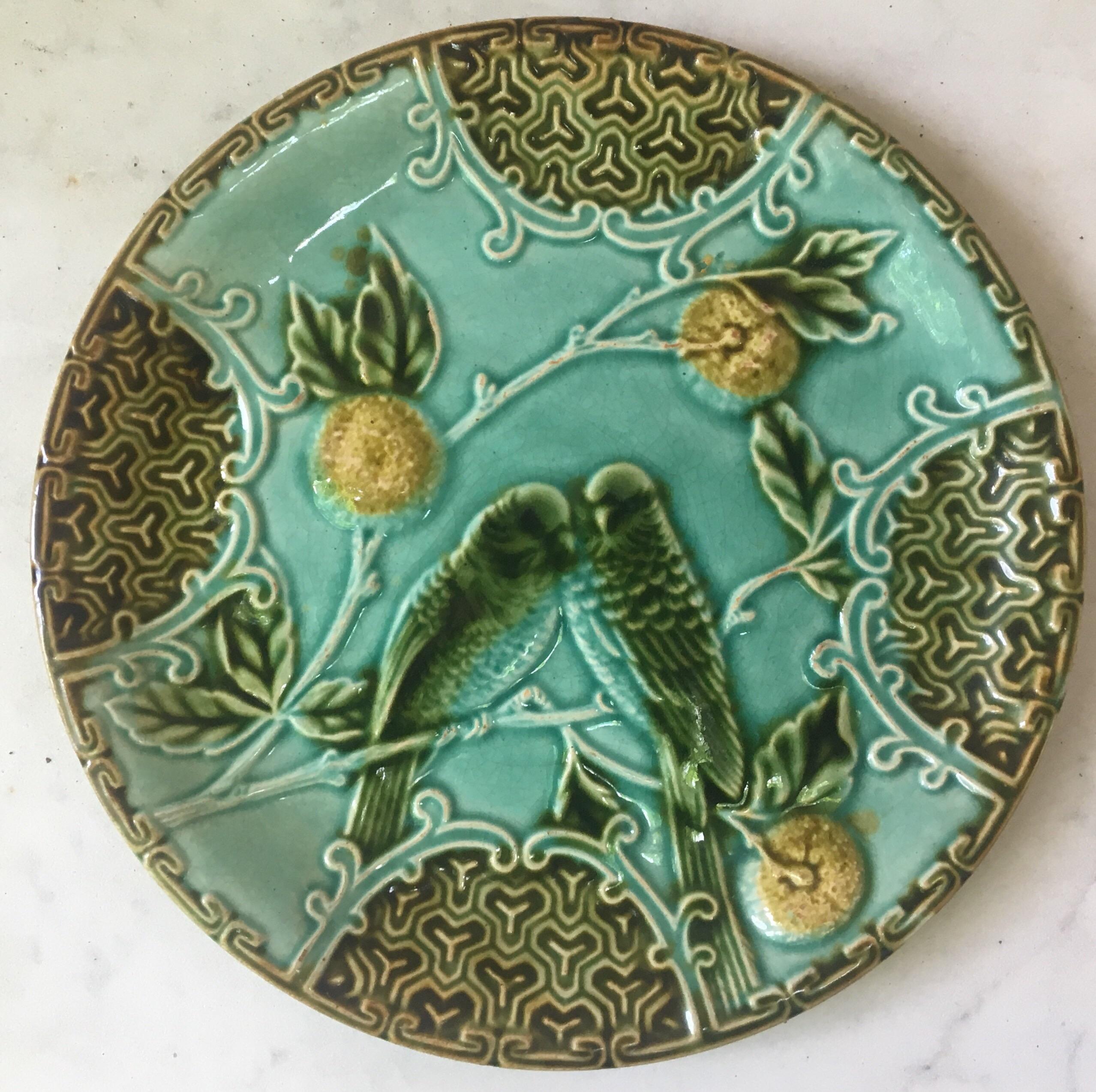 Majolica plate two parakeets on a blue background with oranges of Salins, circa 1890.
3 plates available.