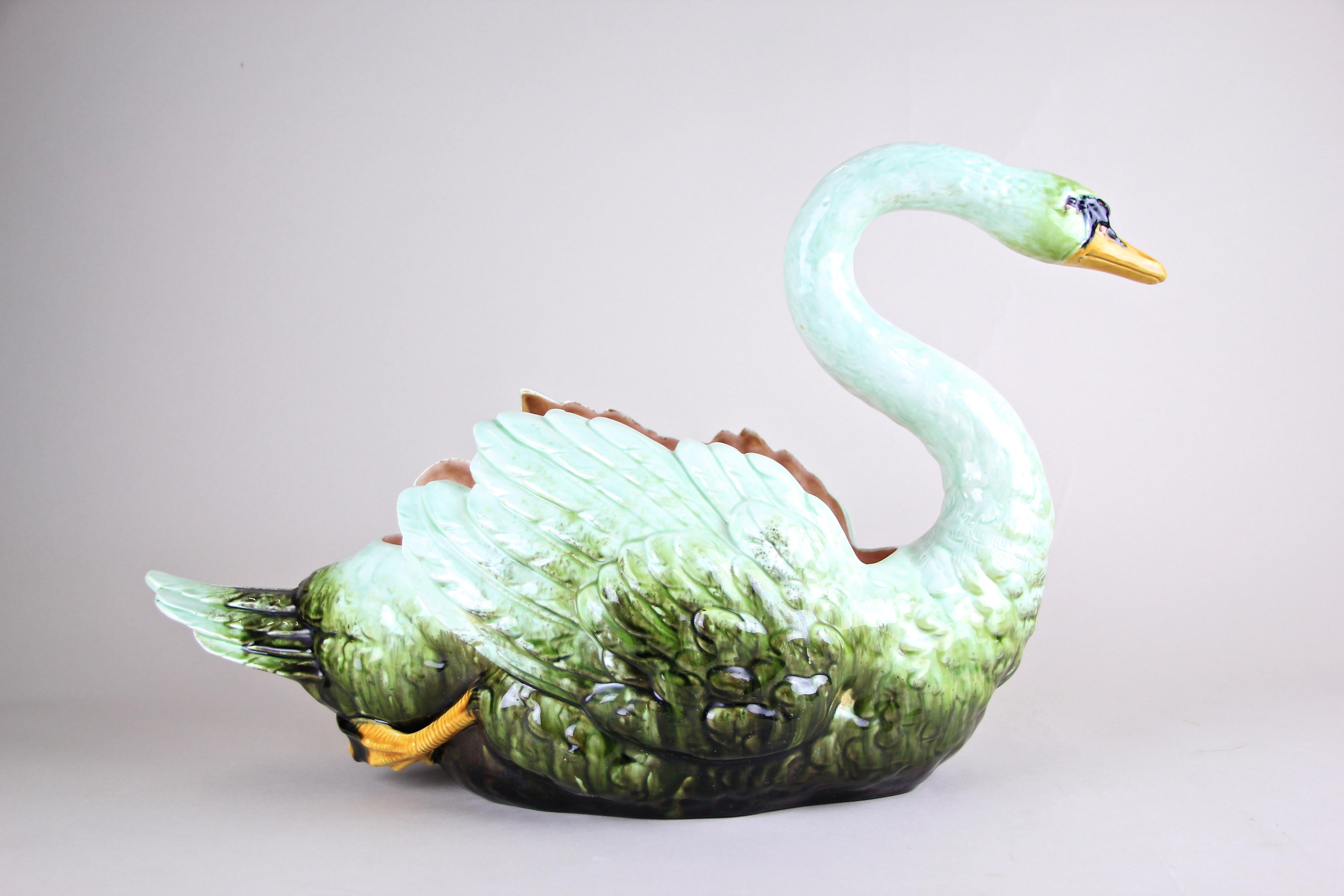 Extremely rare Majolica Swan Planter out of the famous manufactory of Julius Dressler in Bohemia/ Austria, circa 1900. Artfully processed, this unusual large planter was made by keeping highest attention to details. The absolute accurate depiction