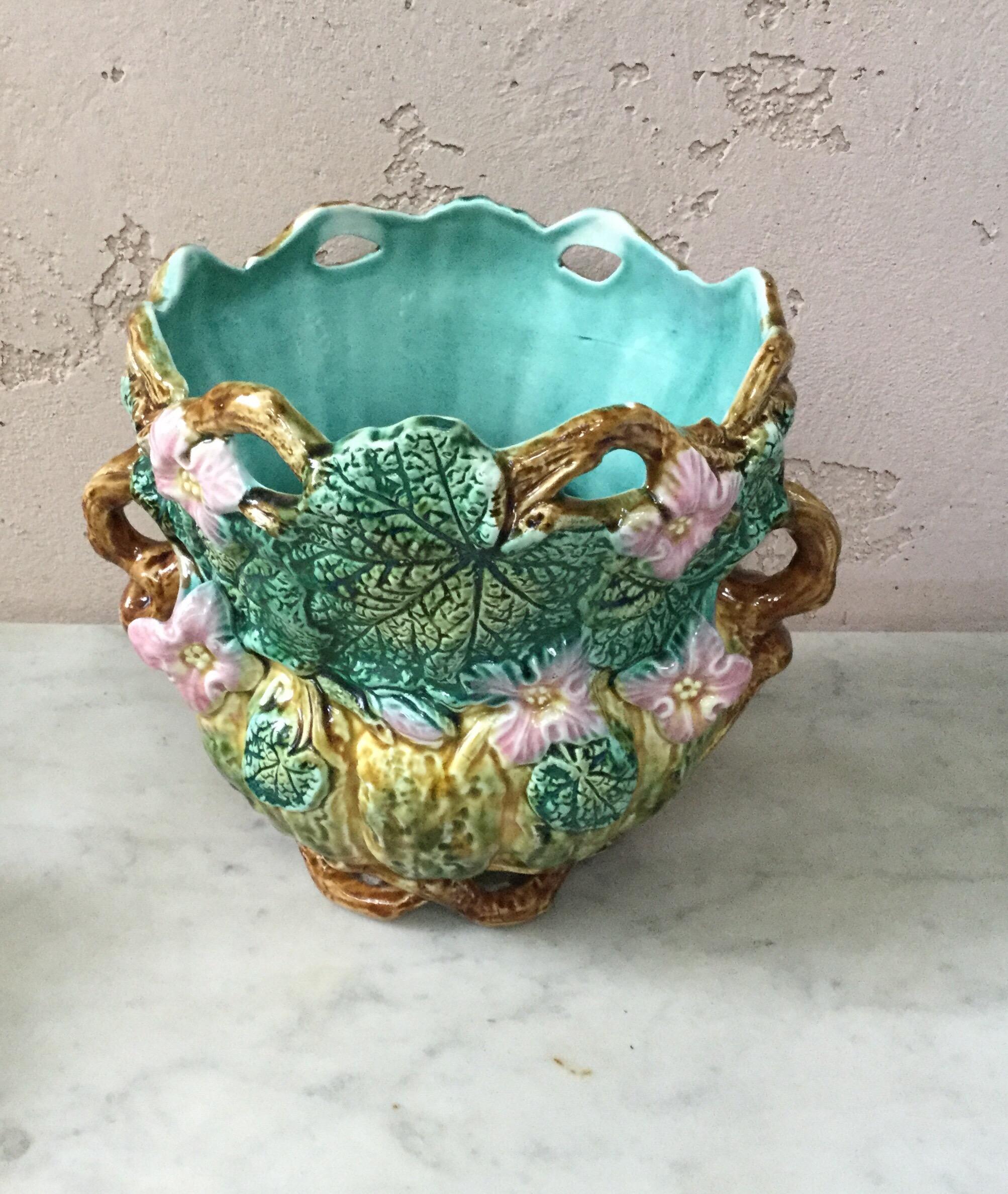 Majolica pumpkin jardiniere Onnaing, circa 1880, a reticulated luminous planter with pumpkin flowers signed Onnaing 407.