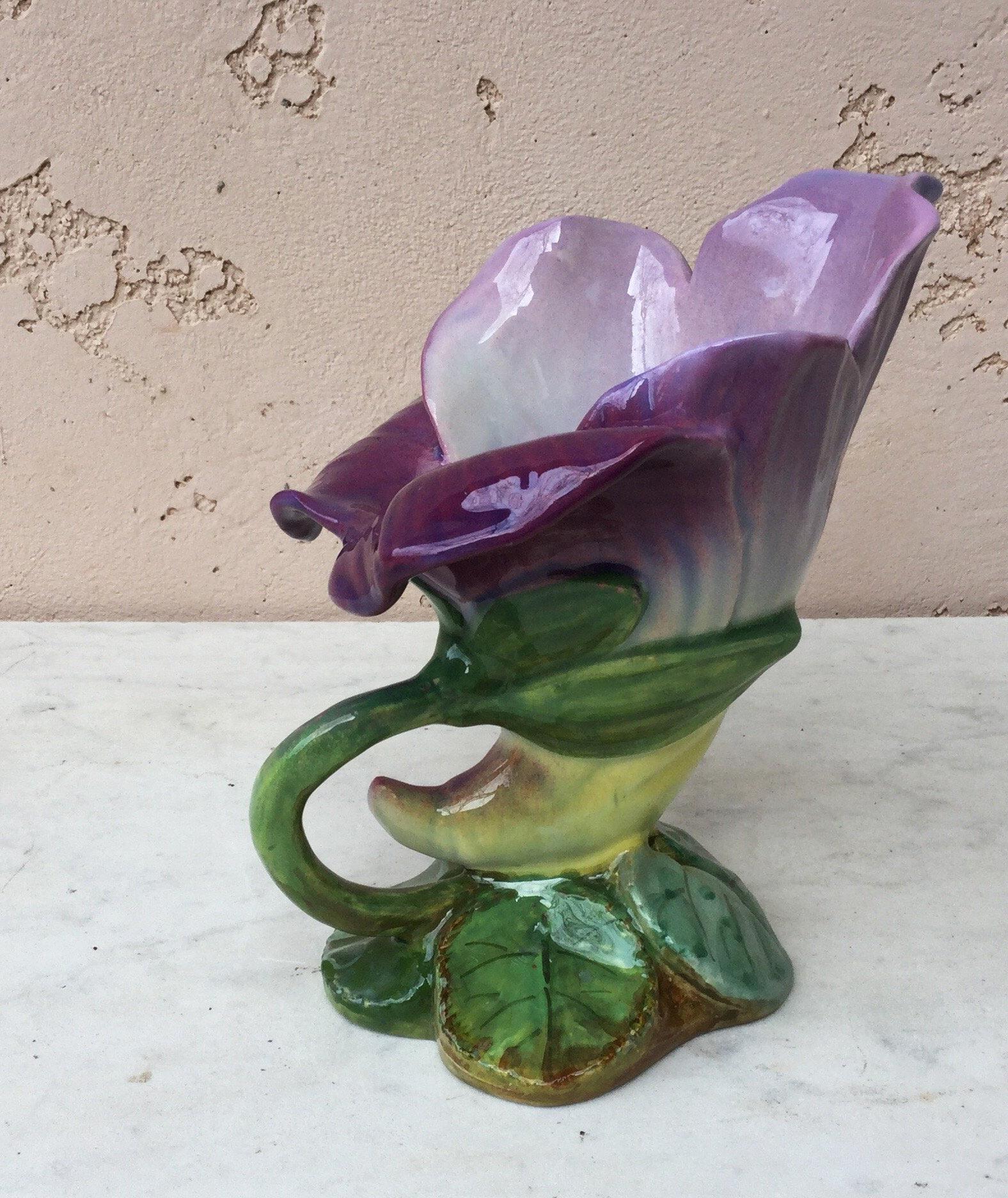 Majolica purple flower vase signed Jerome Massier Fils Vallauris, circa 1890.
The Massier family are known for the quality of their unique enamels and paintings. They produced an incredible whole range of flowers like iris, roses, daisies, wild