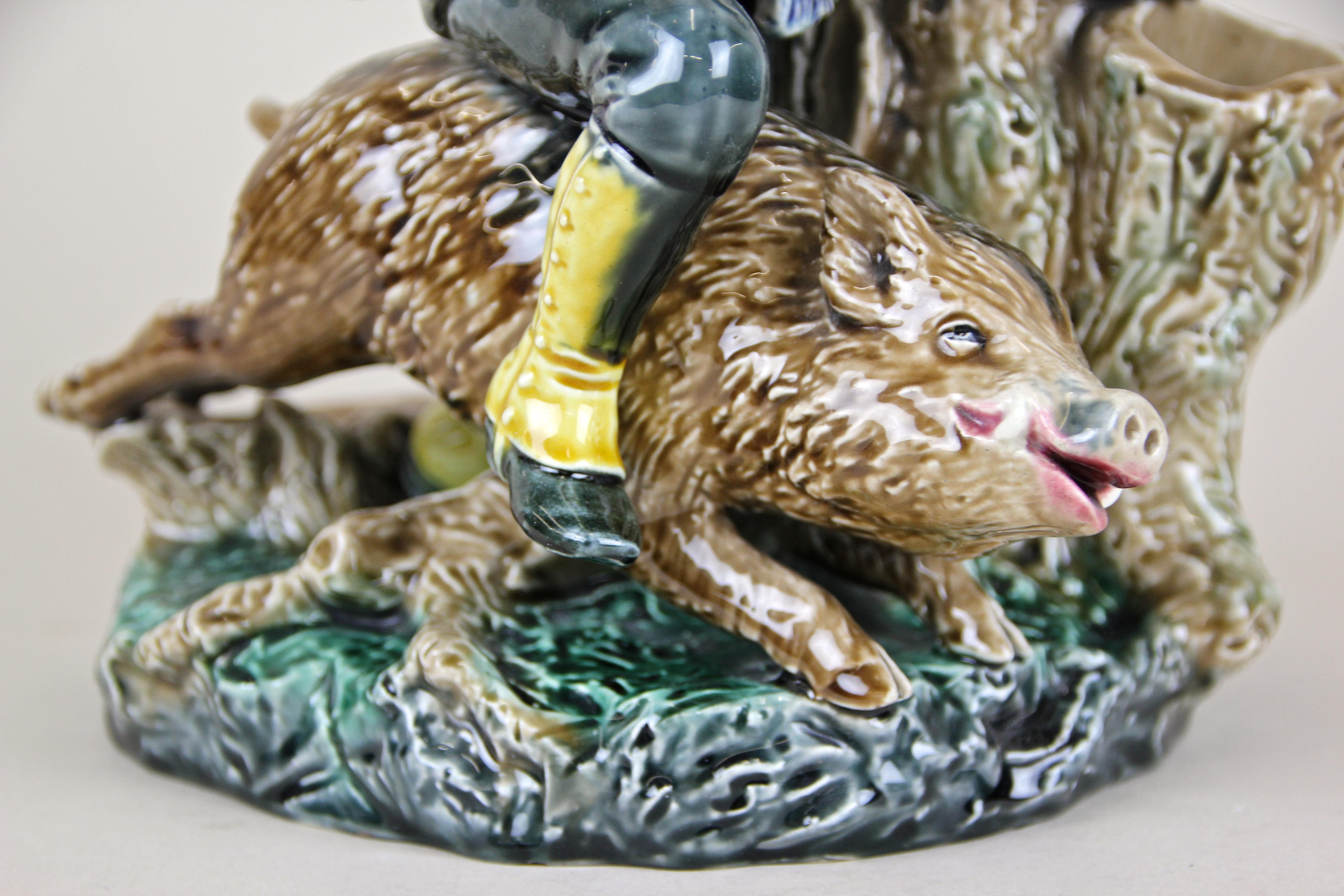Absolute rare Majolica sculpture from the early 20th century by Bernhard Bloch, Eichwald. This extraordinary piece of Majolica art from circa 1900 depicts the famous Austrian emperor Franz Joseph I. in his hunting outfit riding a wild boar. A real