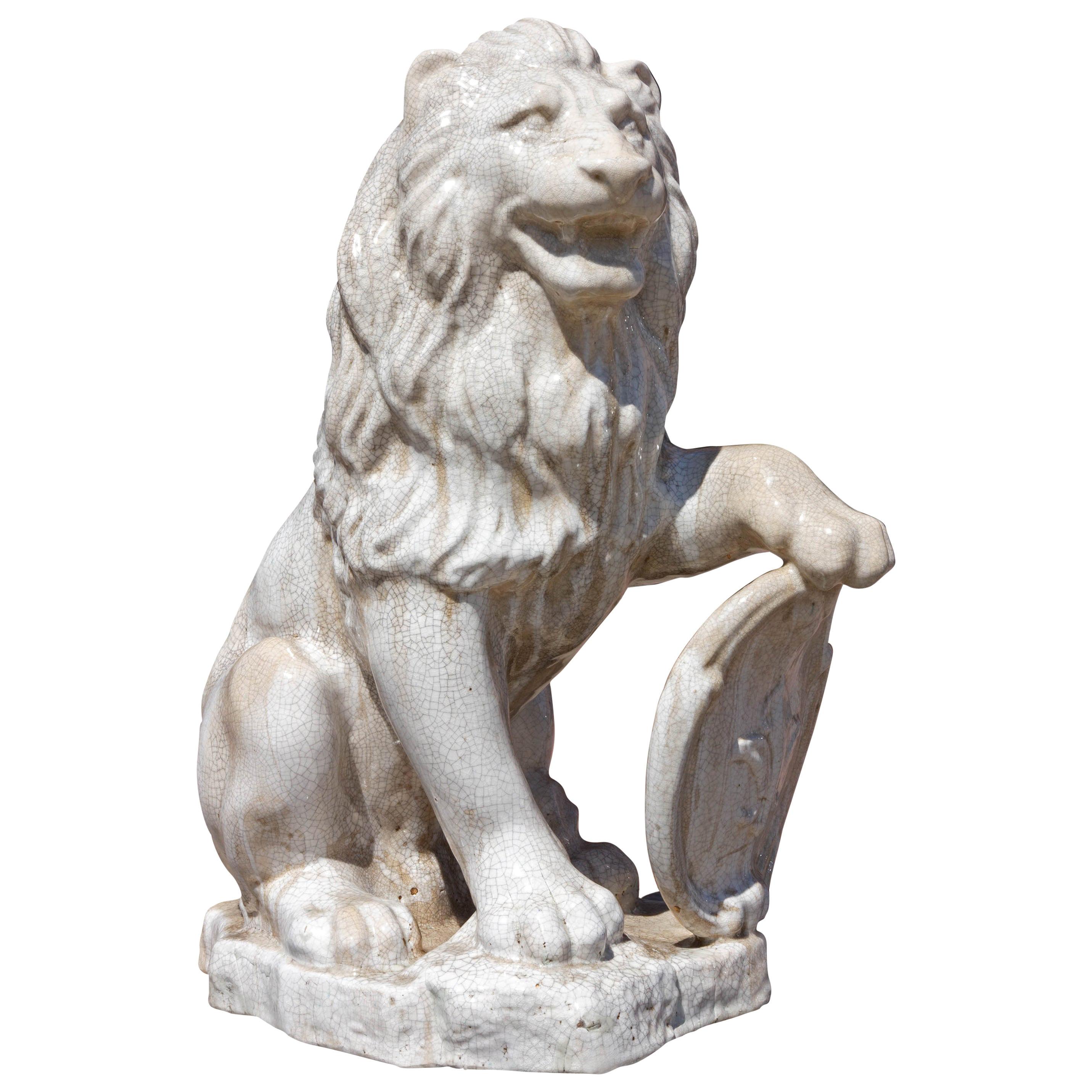 Majolica Seated Garden Lion Sculpture with Heraldic Shield