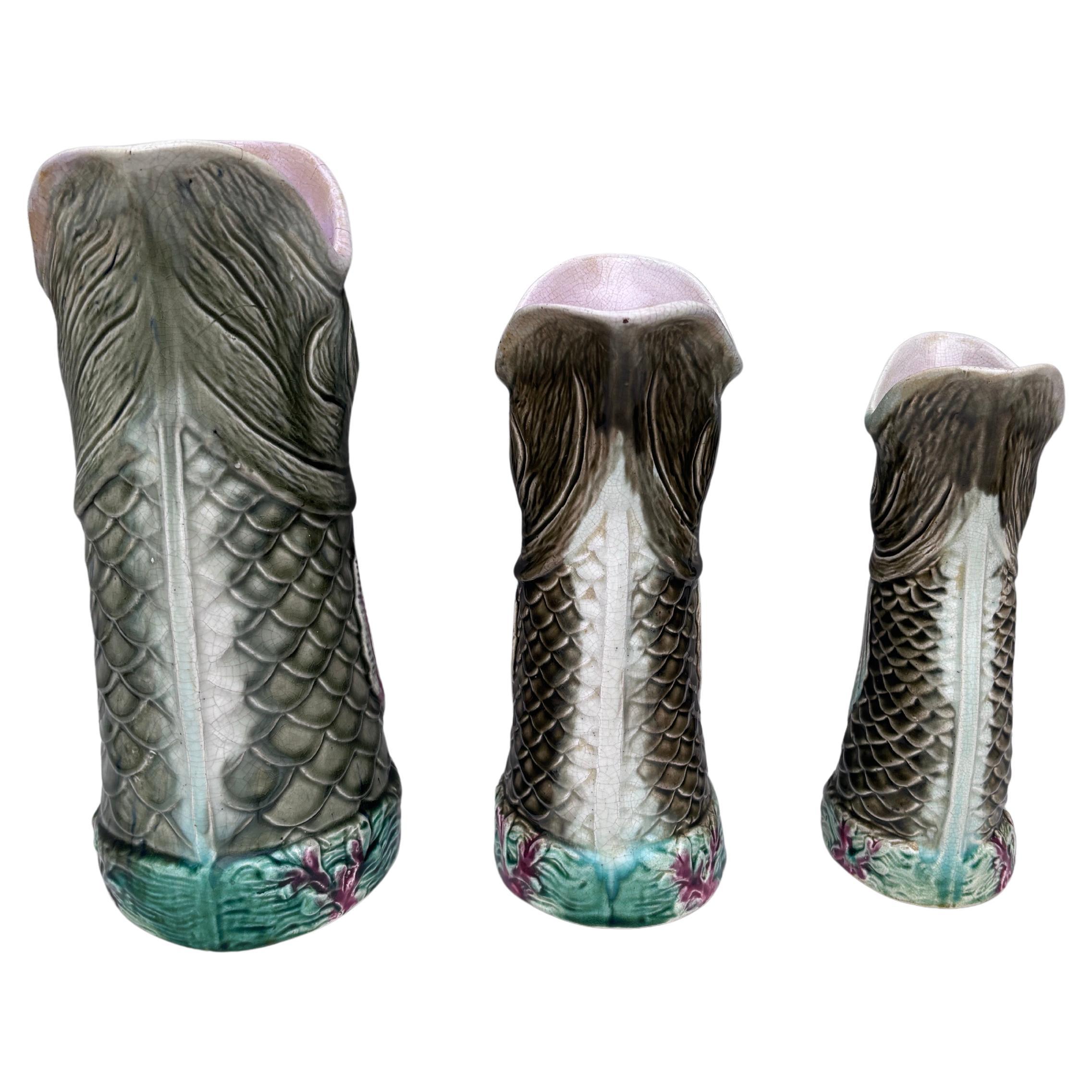 19th Century Victorian Majolica Set of 3 Graduated Fish Pitchers.
H / 10.5 inches , 7 by 4.3 inches.
H / 8.7 inches , 5.5 by 3.3 inches.
H / 7.7 inches , 4.5 by 2.5 inches.
