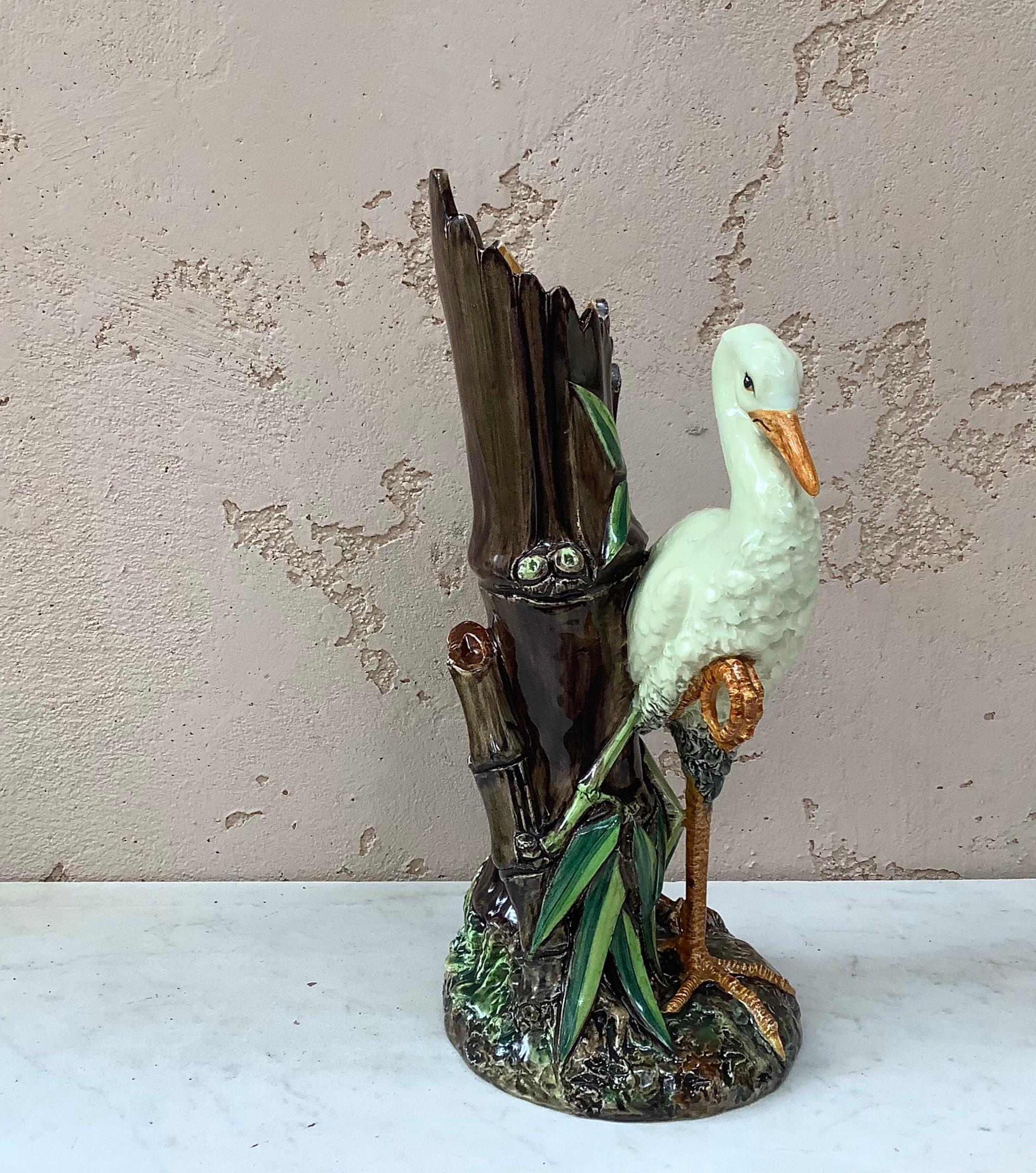 Elegant and rare Majolica stork with a bamboo vase signed Delphin Massier, circa 1890.
The Massier are known for the quality of their unique enamels and paintings. The Massier family excelled in the representation of all animals at the end of 19th