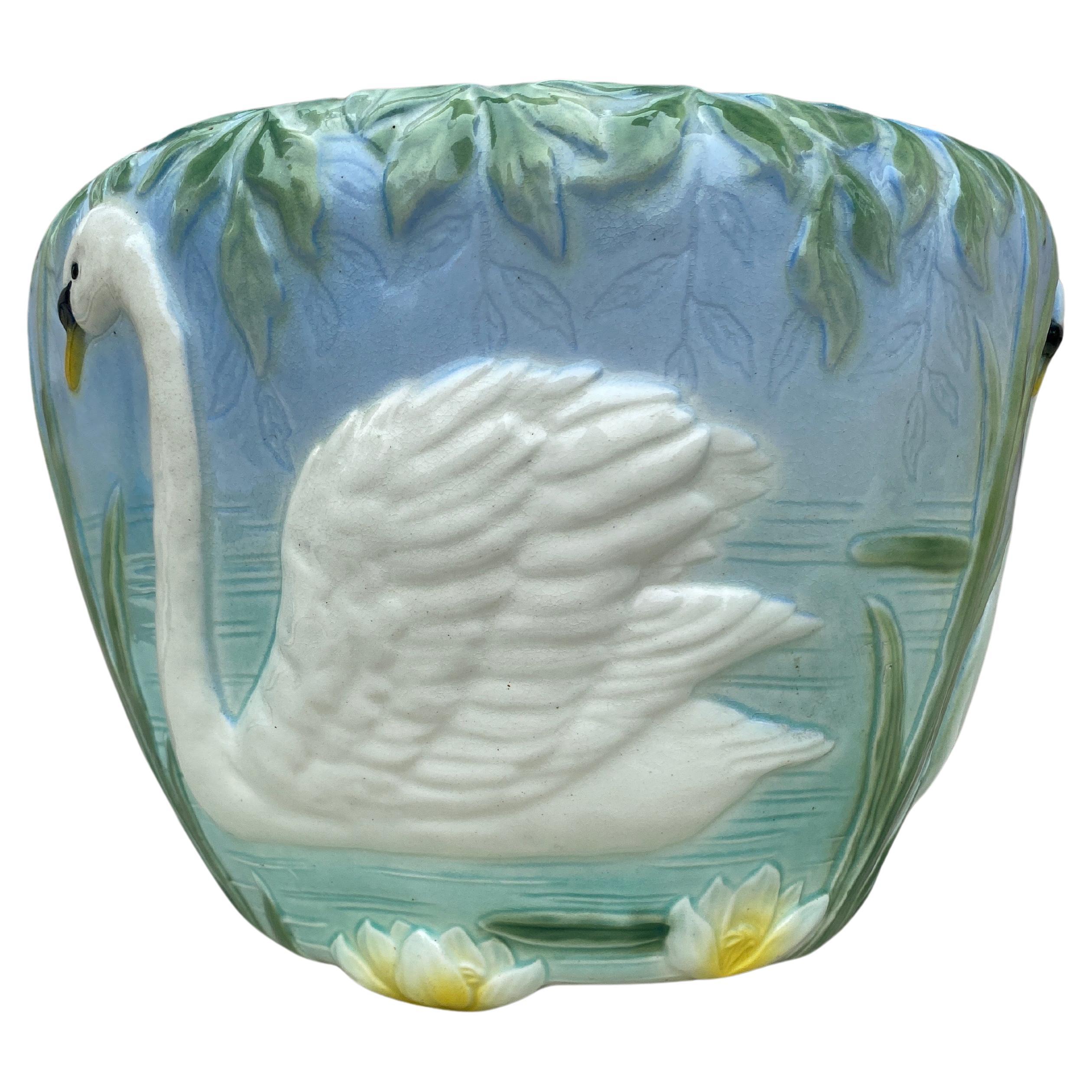 Antique large Majolica planter cache pot with swan on two sides with lily pads and aquatics plants circa 1900 signed Keller and Guerin Saint Clement.
Reference / Page 57 