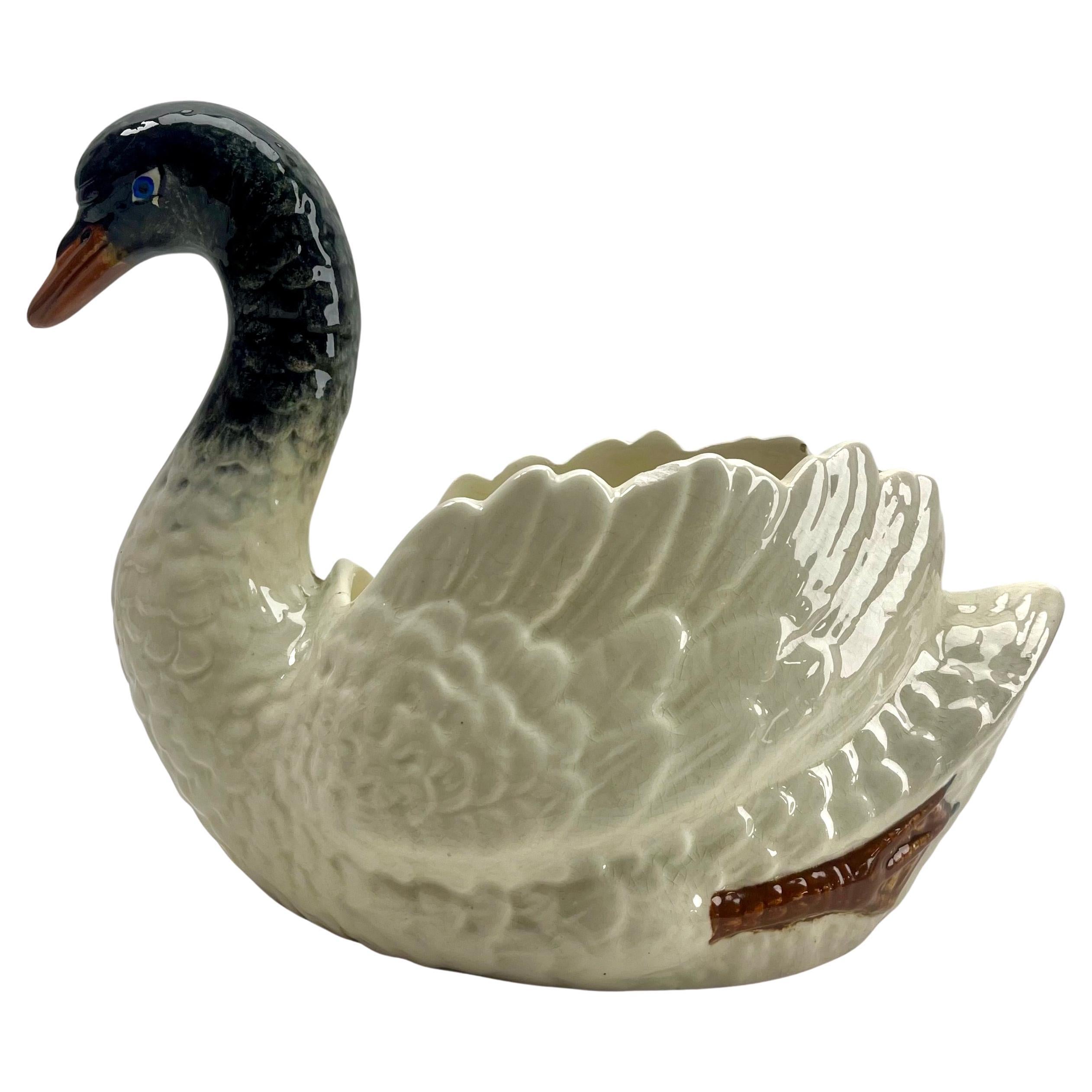 Majolica white swan jardinière Nimy, circa 1900.

A real treasure for the ceramics' collector.
Small chip to top rim not visible during use see photo.

Please don't hesitate to get in touch with any further questions. 

With best wishes,