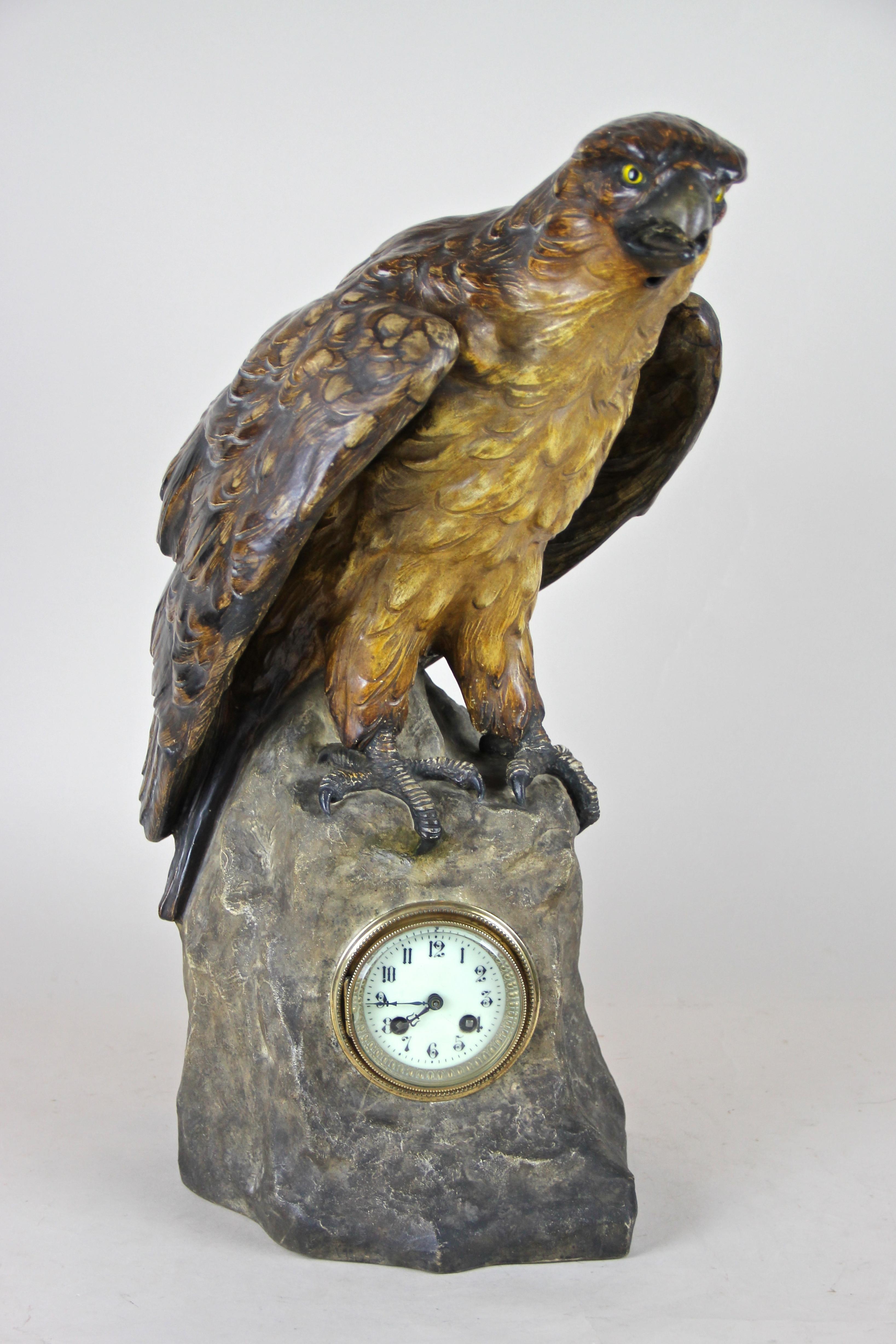 Really rare, large Majolica table clock by Johann Maresch out of Bohemia from the period around 1900, signed by famous artist August Otto. This imposing sculptural table clock depicts an excellent worked eagle sitting on a rock which houses a round