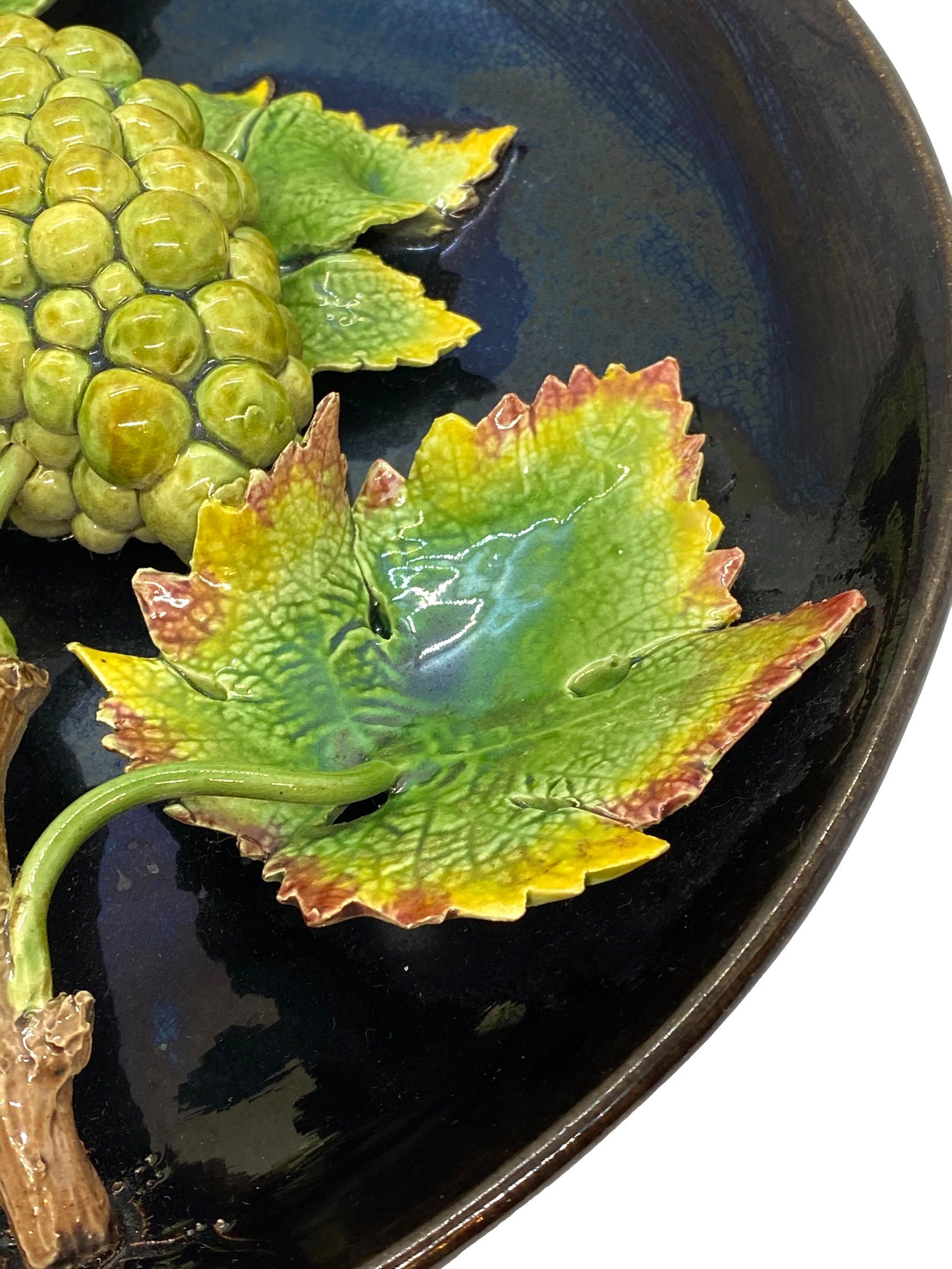 Majolica Trompe L'oeil Plaque with Lifelike Grapes on Cobalt Pinheiro circa 1890 In Good Condition In Banner Elk, NC