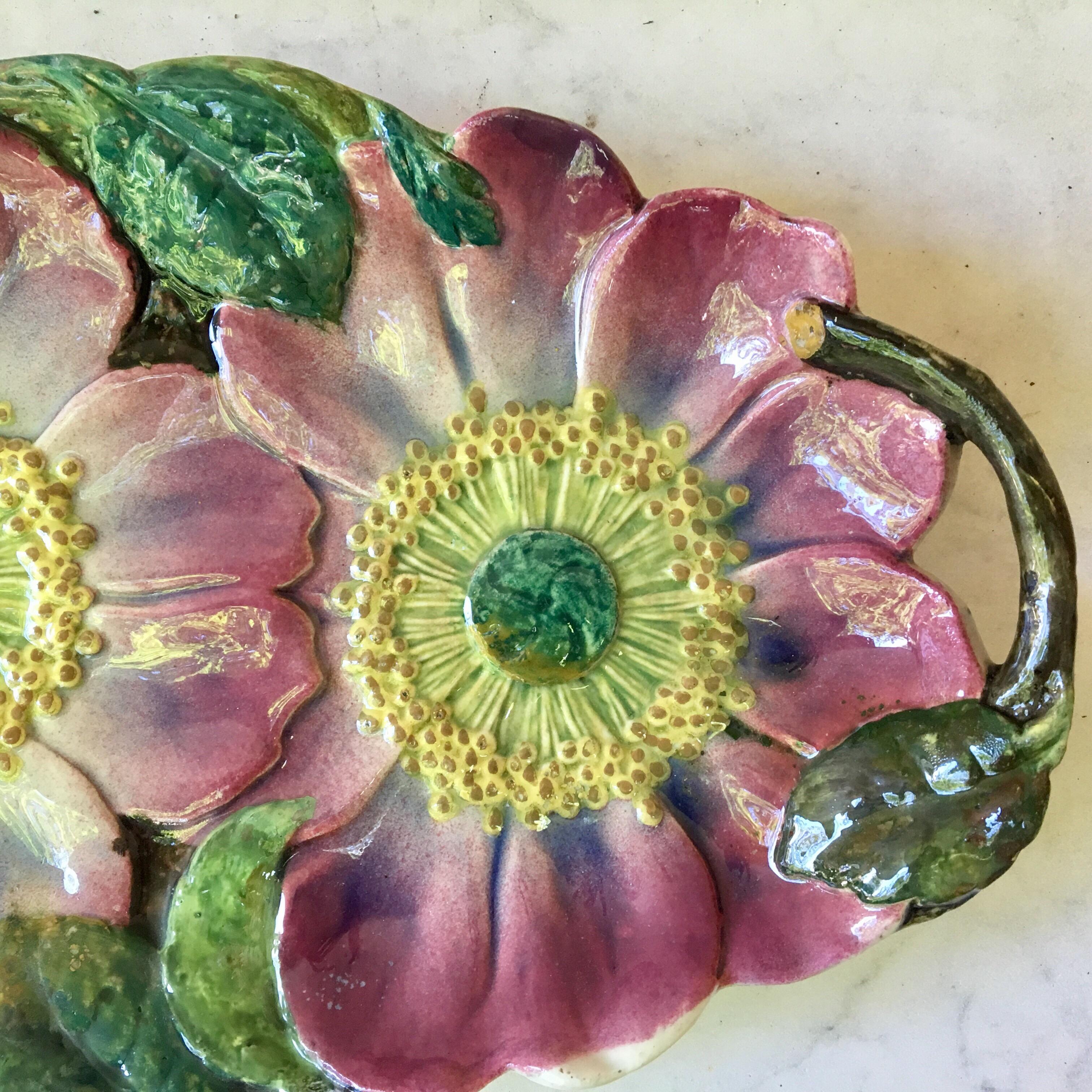 Charming Art Nouveau Majolica handled platter with two pink wild roses signed Jerome Massier Fils, circa 1900.