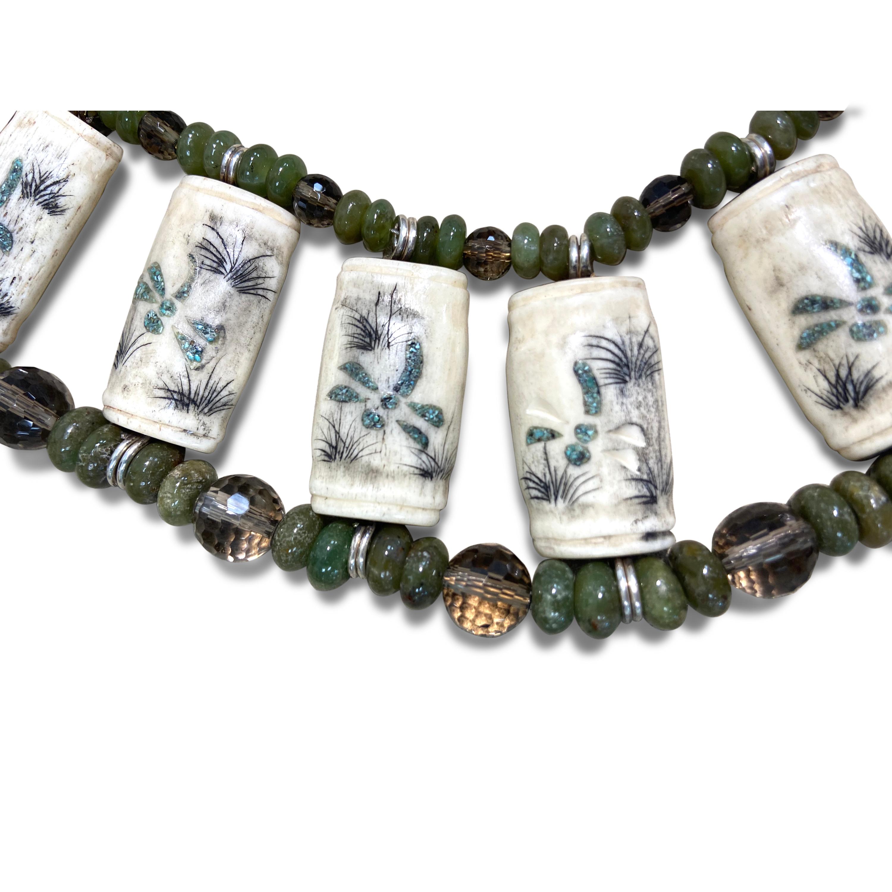 This Bone Mahjong Tile with Inlaid Turquoise Choker Necklace has the perfect allure to compliment any look! Bold, Unique, and Lively it’s a versatile piece that can be worn anywhere the from the home to a night out. This Bone Mahjong Tile with