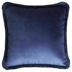 The Collective Coussin velours à franges bleu