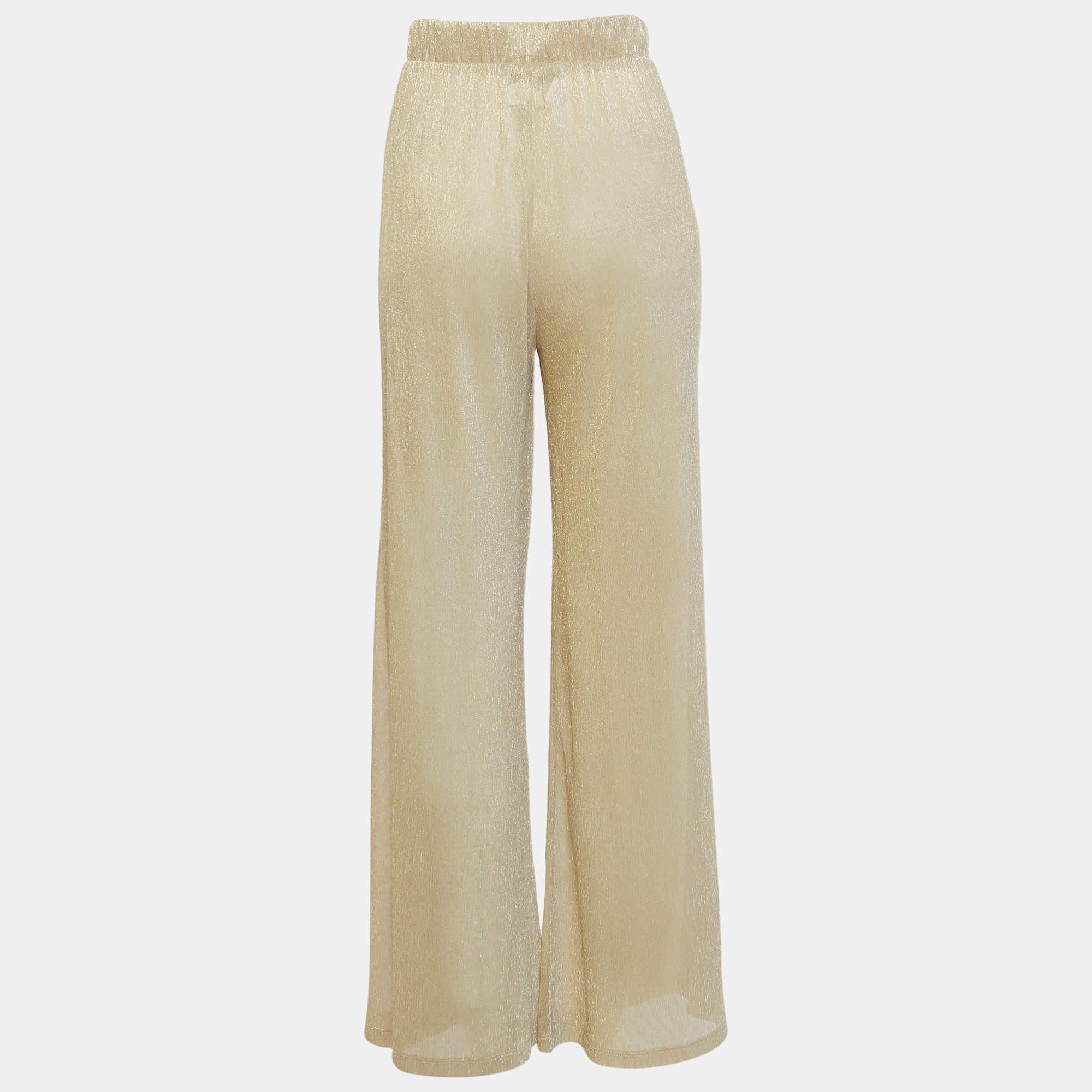 Ce pantalon Majorelle a été conçu dans un souci de confort et de luxe afin que vous puissiez le porter longtemps. La paire est taillée dans un tissu lurex et présente une jambe large.