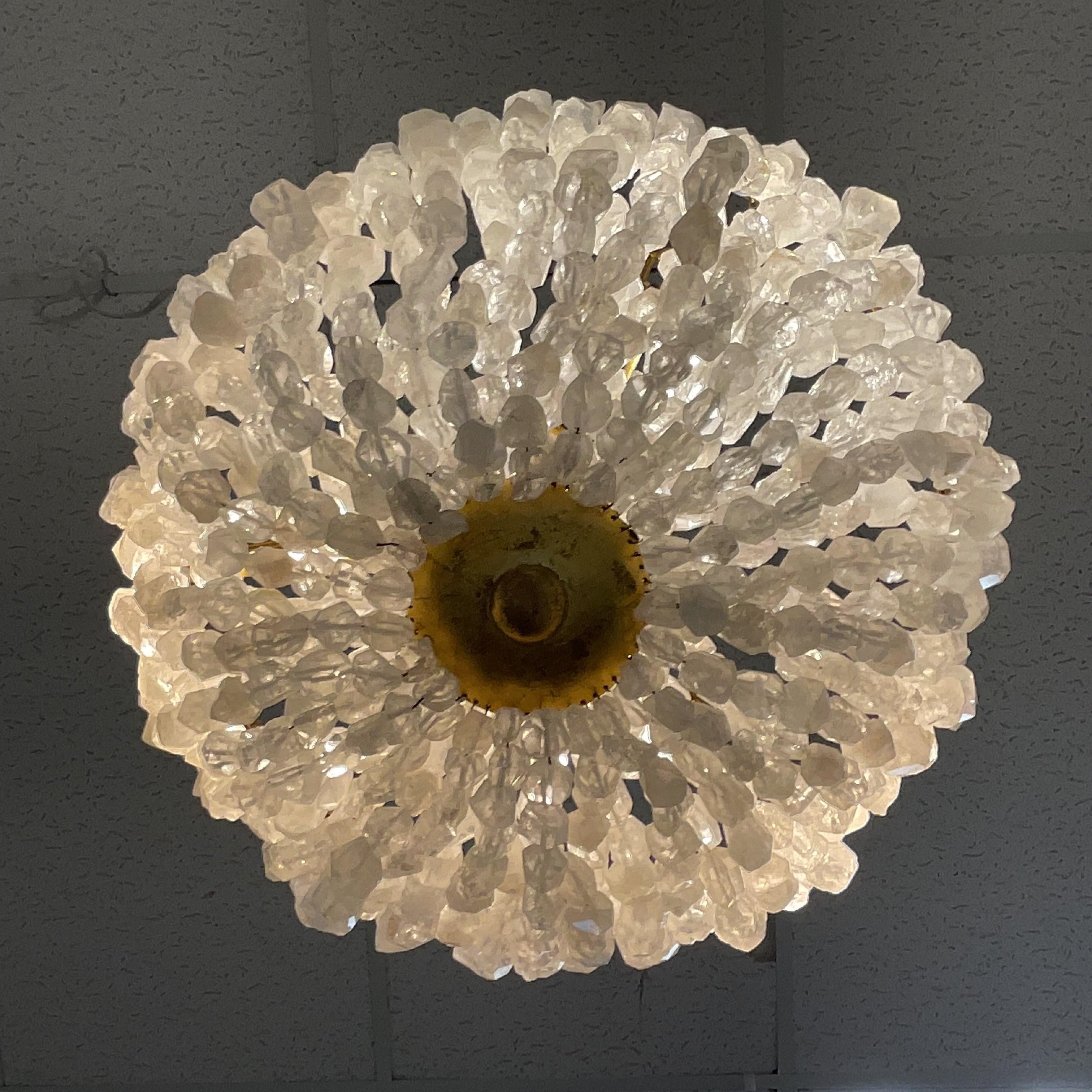 Gorgeous Large Rock Crystal Basket Chandelier. This item is listed as a single but we have two available. Majorie Skouras Aleka was designed with Amber agate trim gold leaf frame, and natural rock crystal chunks. Dramatic and beautiful.
