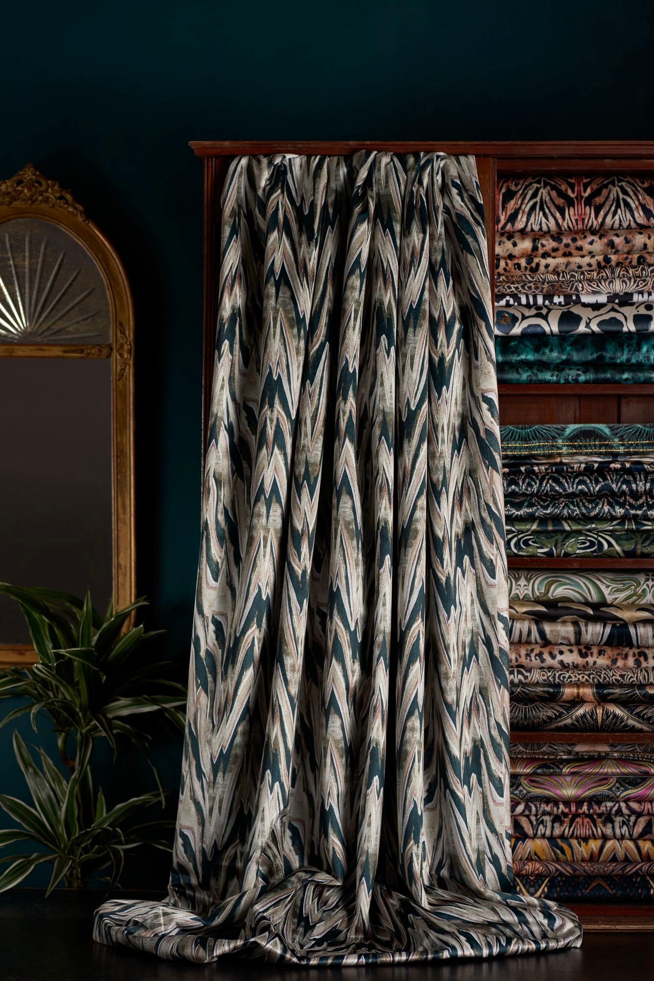 Our take on a tiger print – Makemba Mink is a bold and distinctive design in a neutral palette of mushroom, black and cream.

This velvet is midweight, with a strong straight woven backing, so is suitable for upholstery, but is also light enough