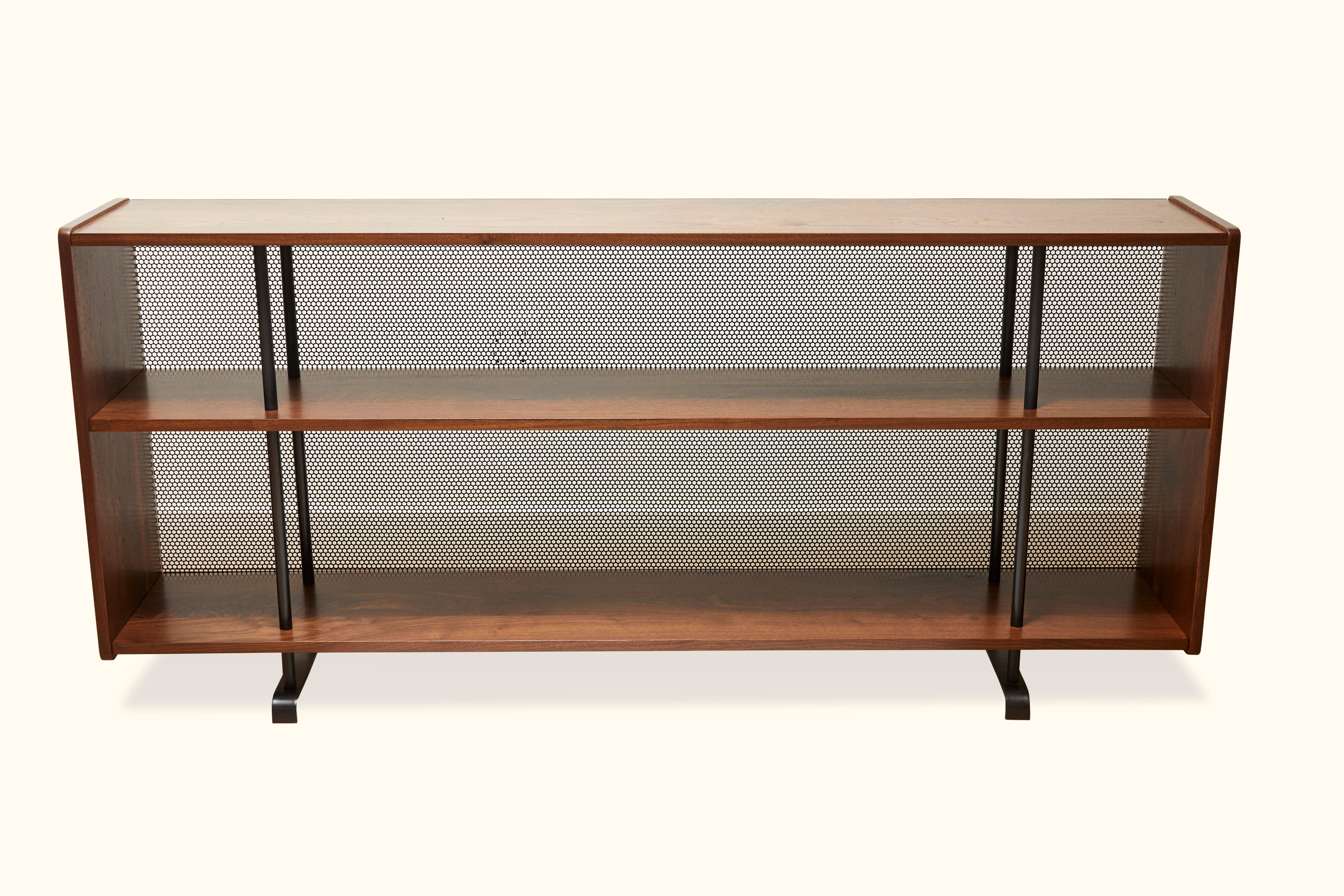 The Maker's Console is made of American walnut or white oak and rests on a blackened steel base. Features two shelves and a perforated steel detail on the back. Shown here in Light Walnut

The Lawson-Fenning Collection is designed and handmade in