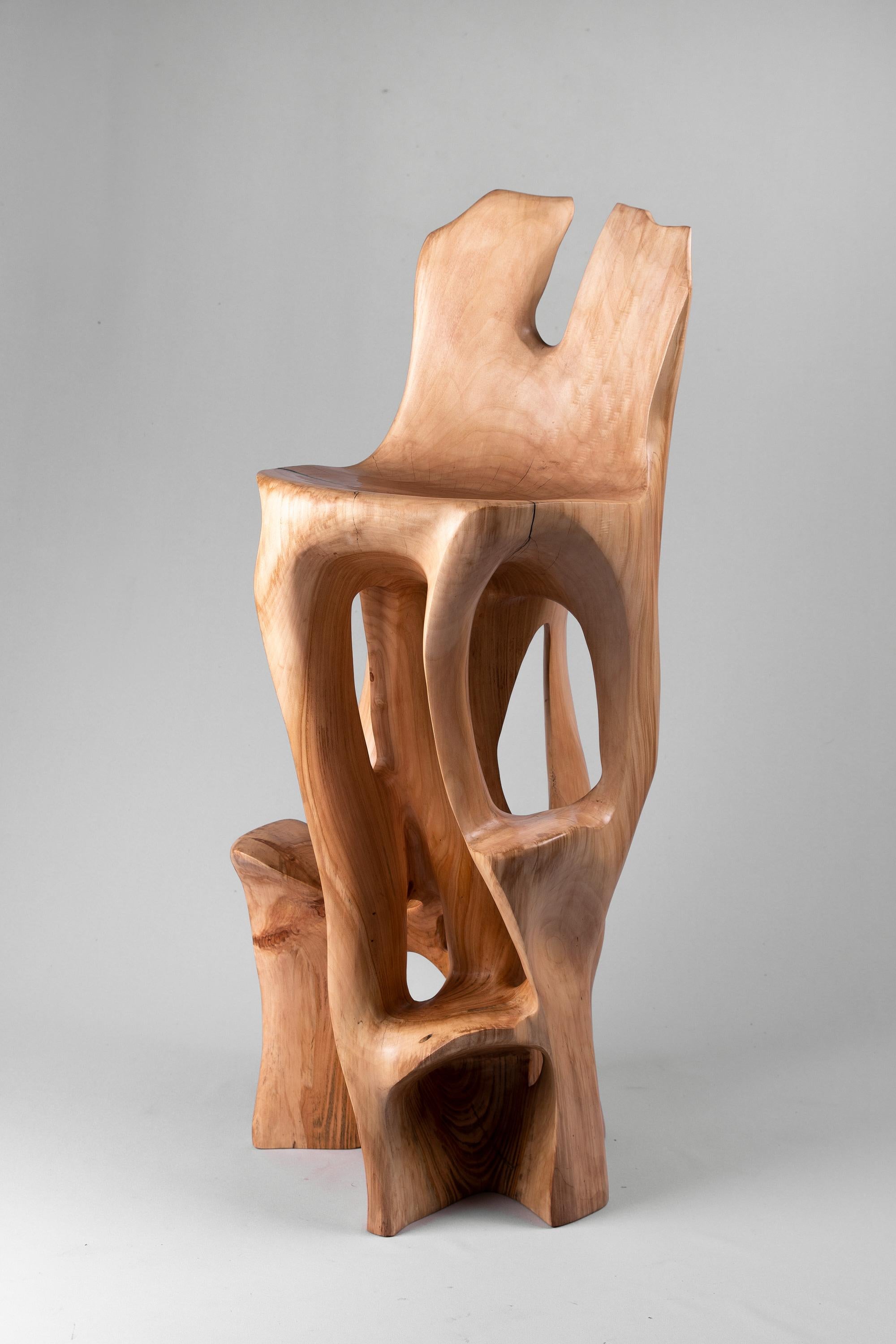 Unique chainsaw carved wooden functional sculpture usable as a bar chair. Carved from a single piece of wood and protected with the highest quality oils, ensuring durability for generations. Such unique handmade design will highlight your interior