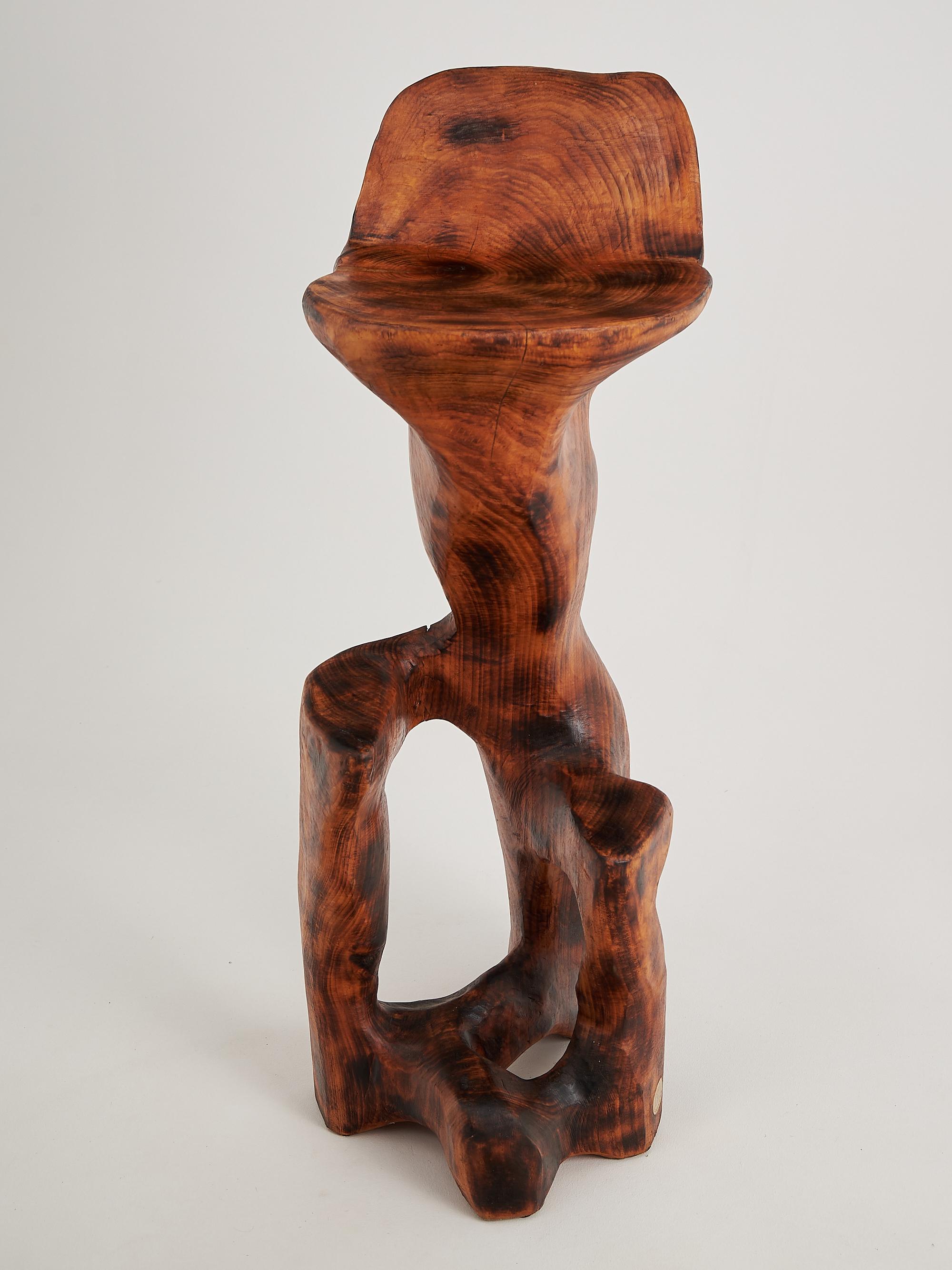 Unique chainsaw carved wooden functional sculpture usable as a bar chair. Carved from a single piece of wood and protected with the highest quality oils, ensuring durability for generations. Such unique handmade design will highlight your interior