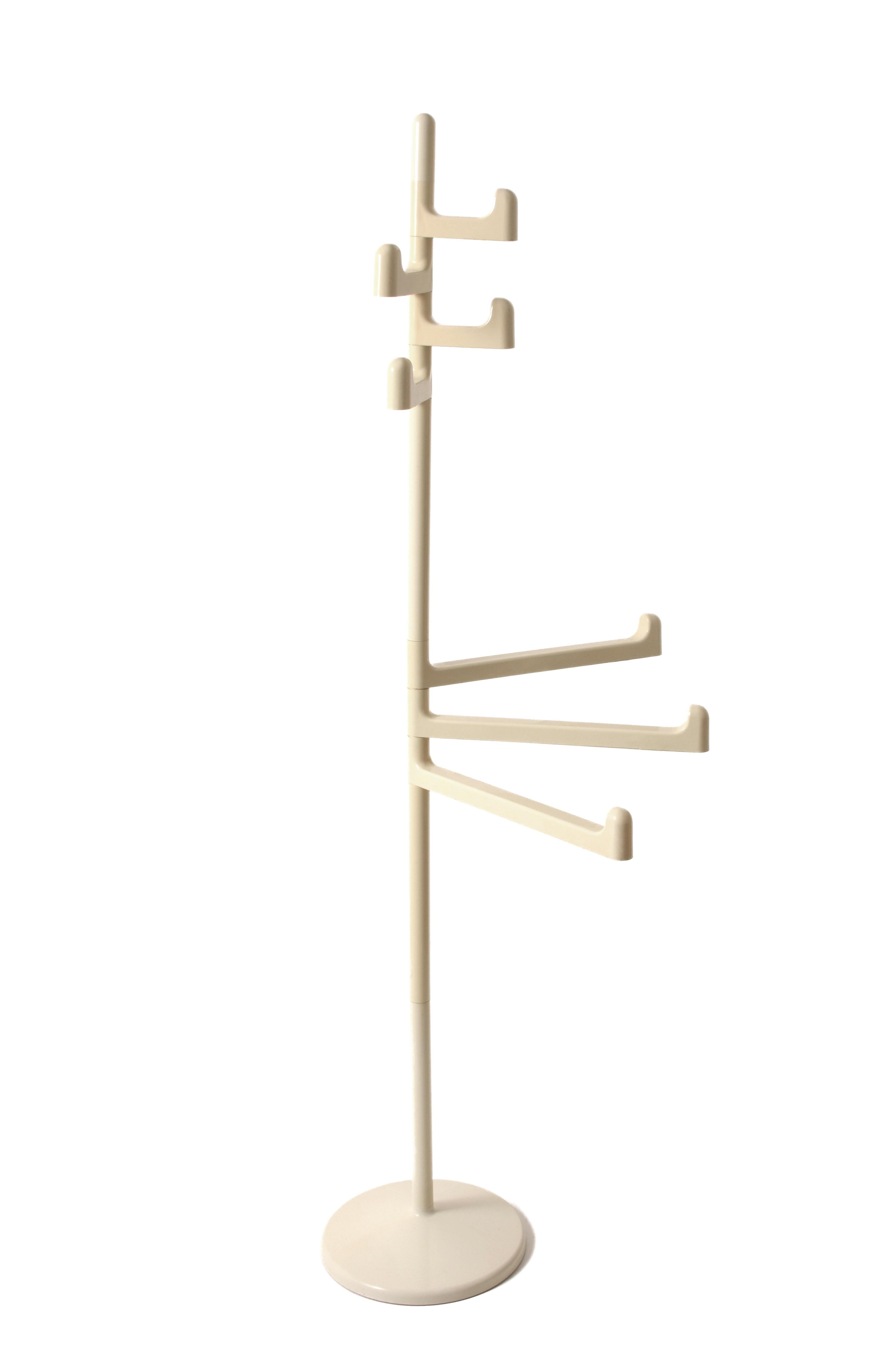 Midcentury Italian white metal and plastic coat rack. This fantastic piece was designed in Italy by Mario Hasuike.

This piece is modern and sophisticated with a weighted base and large adjustable arms, while the small ones are fixed. The large