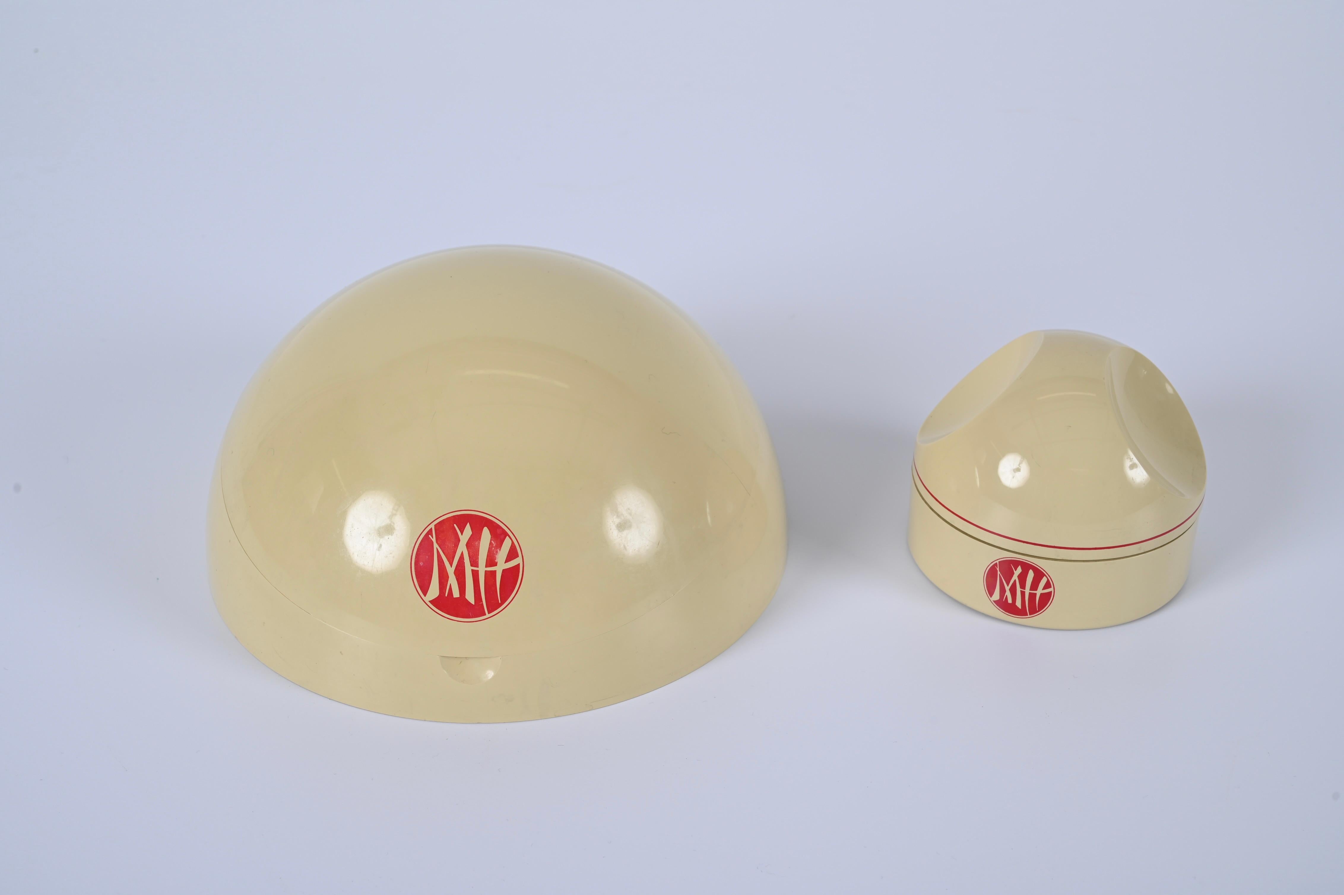 Wonderful midcentury set of spherical plastic make-up and storage boxes. Makio Hasuike designed this set during the 1970s, as a part of the Roberta collection, and produced Gedy it.

The set is composed of a stunning rare vintage make-up box with