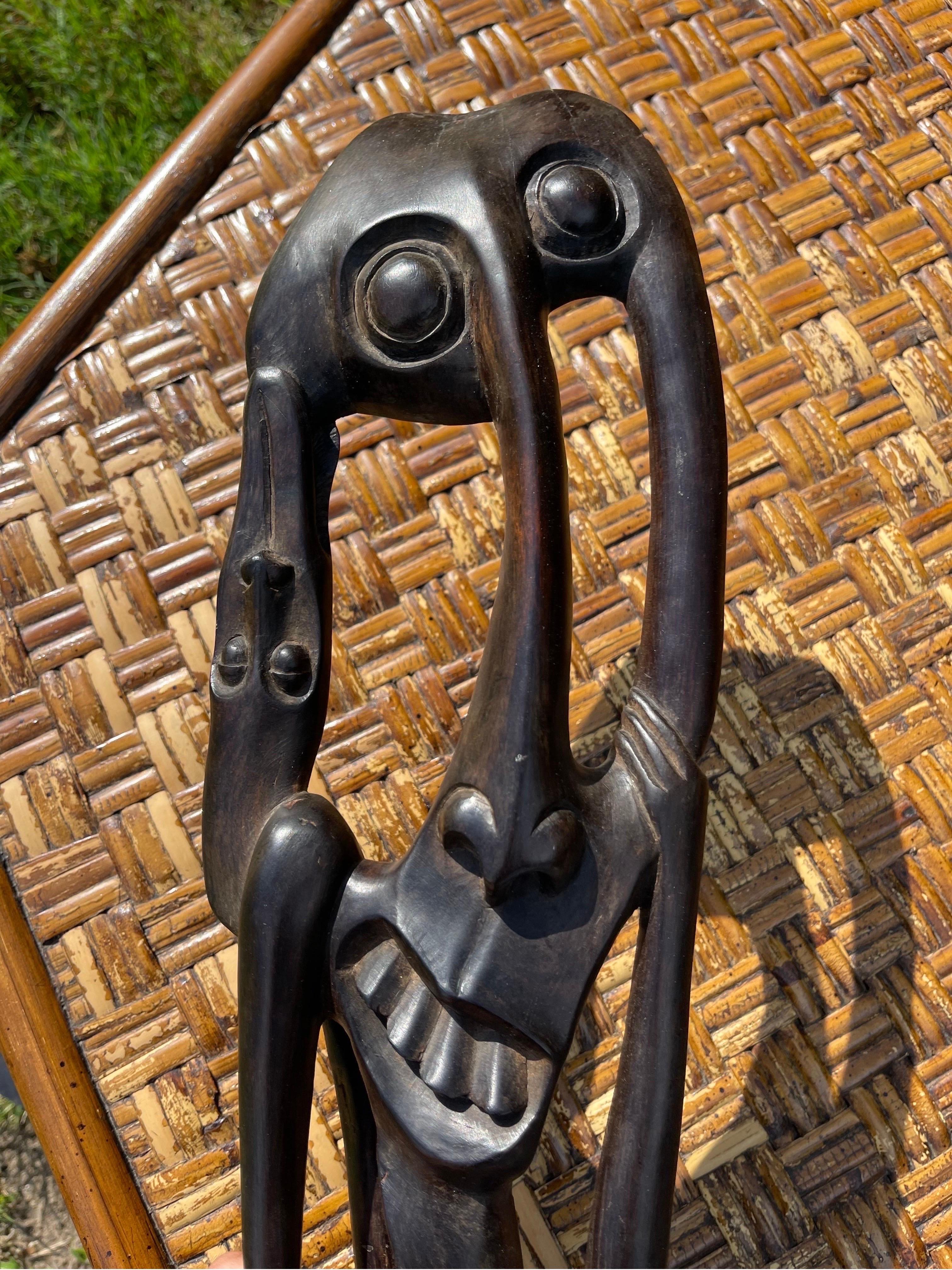 20th Century Makonde Ebony Carved African Sculpture of Abstract Faces For Sale