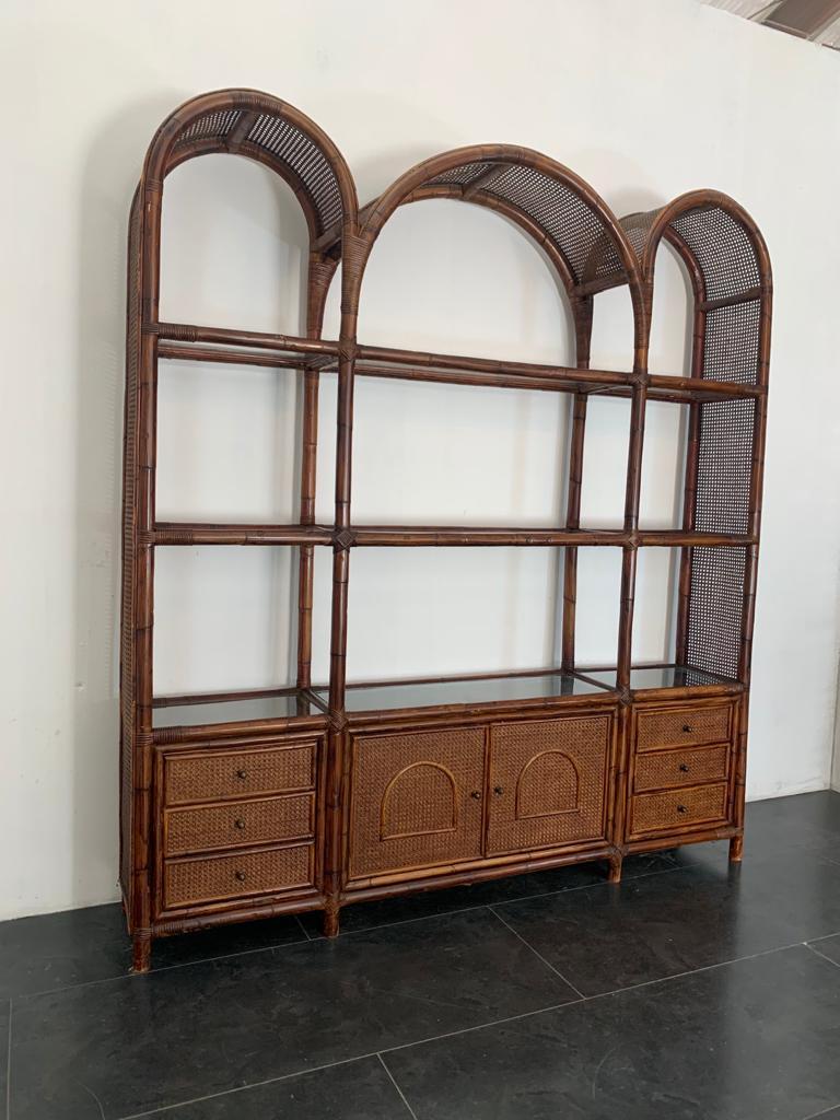 Malacca rattan & crystal bookcase from Vivai del Sud, 1970s
Packaging with bubble wrap and cardboard boxes is included. If the wooden packaging is needed (crates or boxes) for US and International Shipping, it's required a separate cost (will be