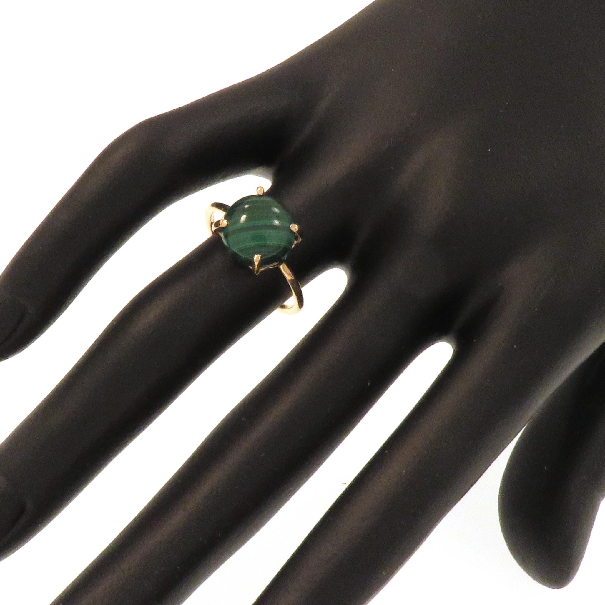 Cabochon cut malachite featured in a contemporary ring crafted in 9 karat rose gold. The size of the gemstone is 10x10 mm / 0.393x0.393 inches. US finger size is 6 , French size 52, Italian size 12, resizable to the customer's size before shipment.