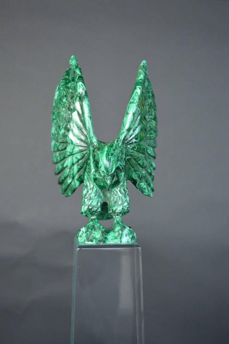 Russian malachite and acrylic obelisk with perched eagle.