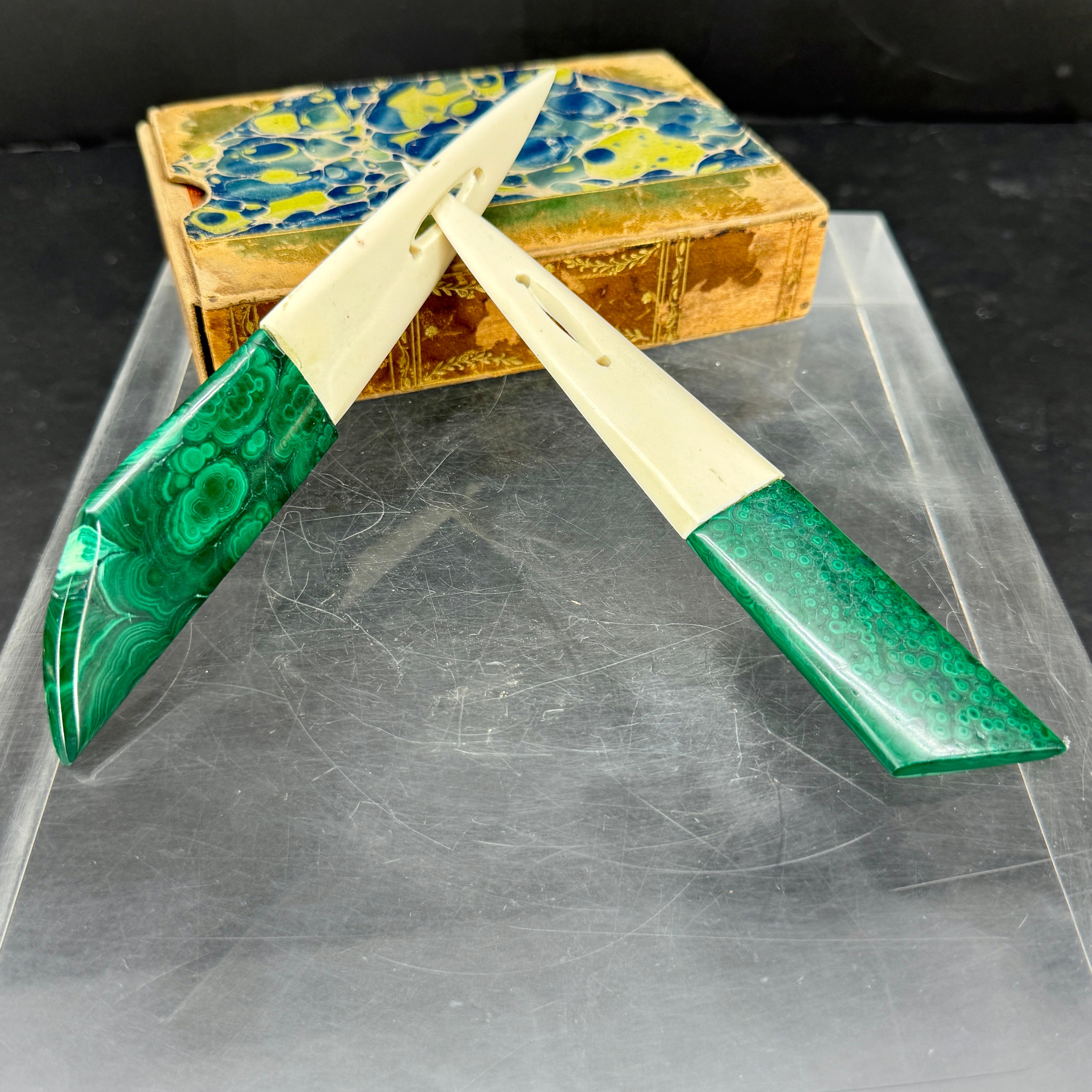 Two Malachite and bone letter knives.
Wonderful vintage letter openers with malachite handles. These would make a perfect gift for and office or functional luxury to use daily. 
Price listed is per item, not for the set of 2.
Measurements for each