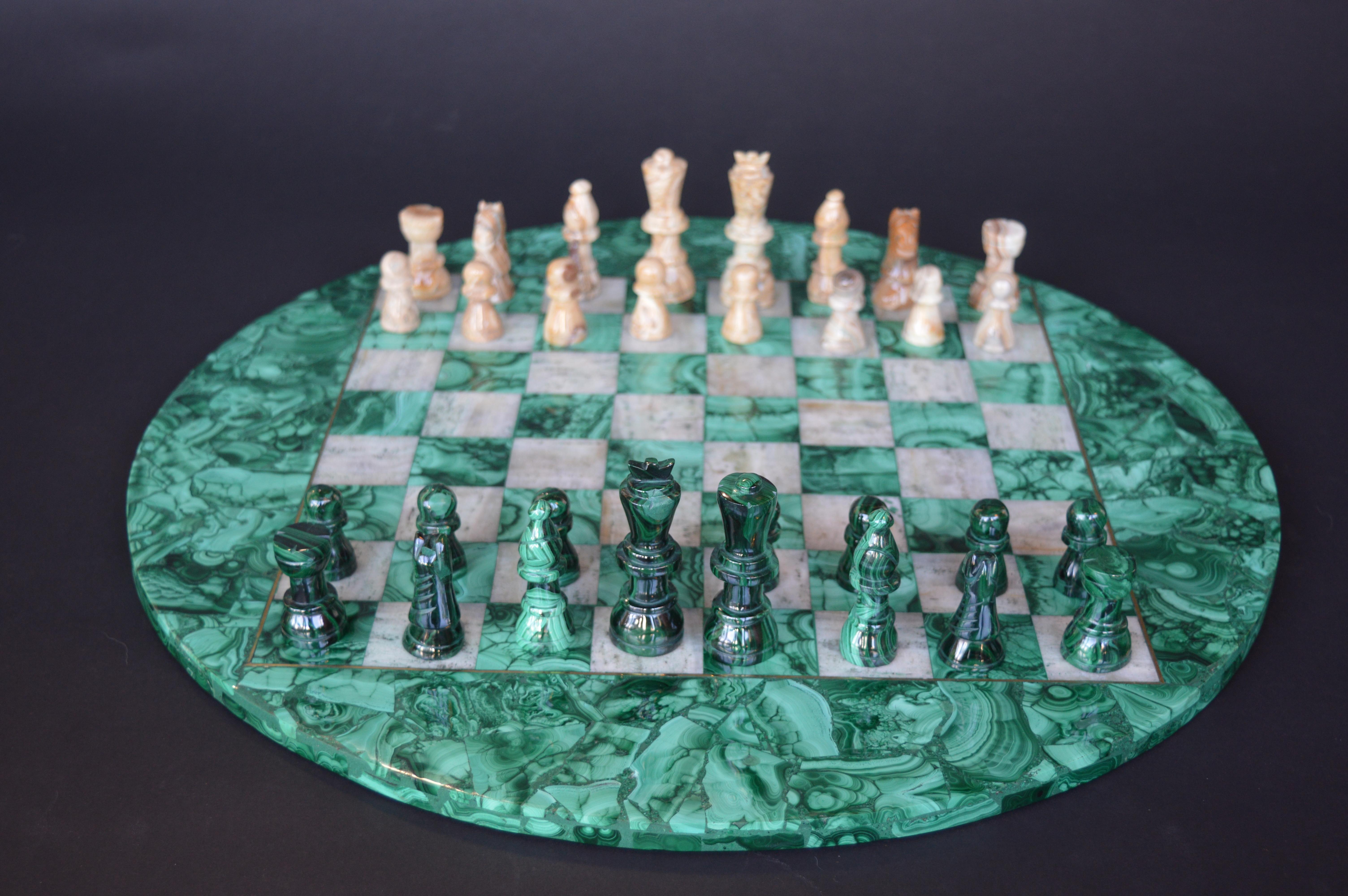 Malachite and marble chess set with matching pieces.