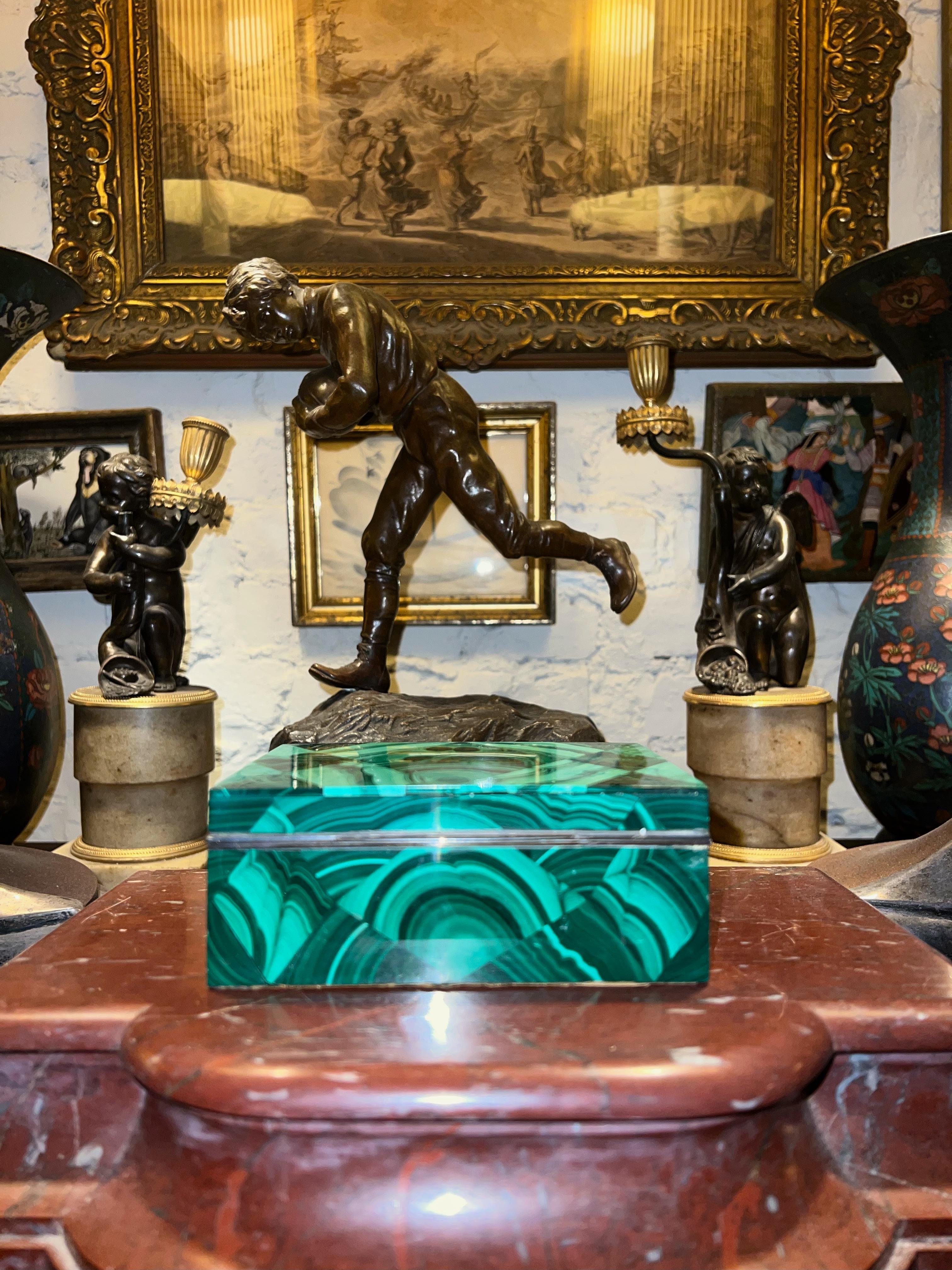 Mr. Giallo is opening his personal vault to sell a collection of his treasured antiques he's held on for so long.

About item
Rich Malachite Box with sterling silver trim and interior lined with red velvet. Could be used for your trinket statement