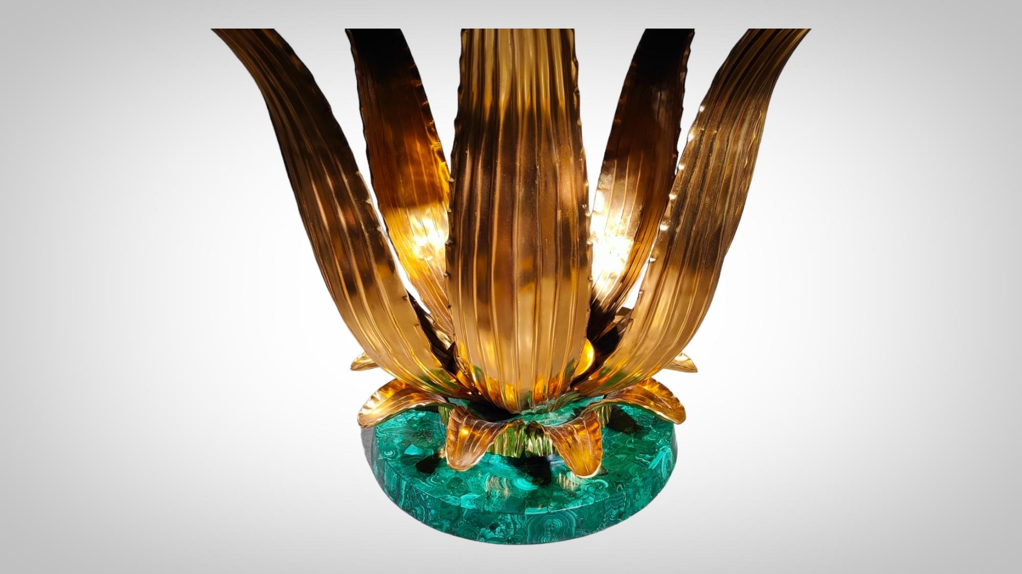Monumental Cactus Table In Malachite Lalique Style

MAGNIFICENT 20TH CENTURY MALACHITE TABLE POSSIBLY FRENCH OR ITALIAN MADE ON ORDER. THE BASE IS MADE OF GILDED BRONZE IN THE SHAPE OF CACTUS LEAVES IN THE LALIQUE STYLE. THE TOP OF THE TABLE IS IN