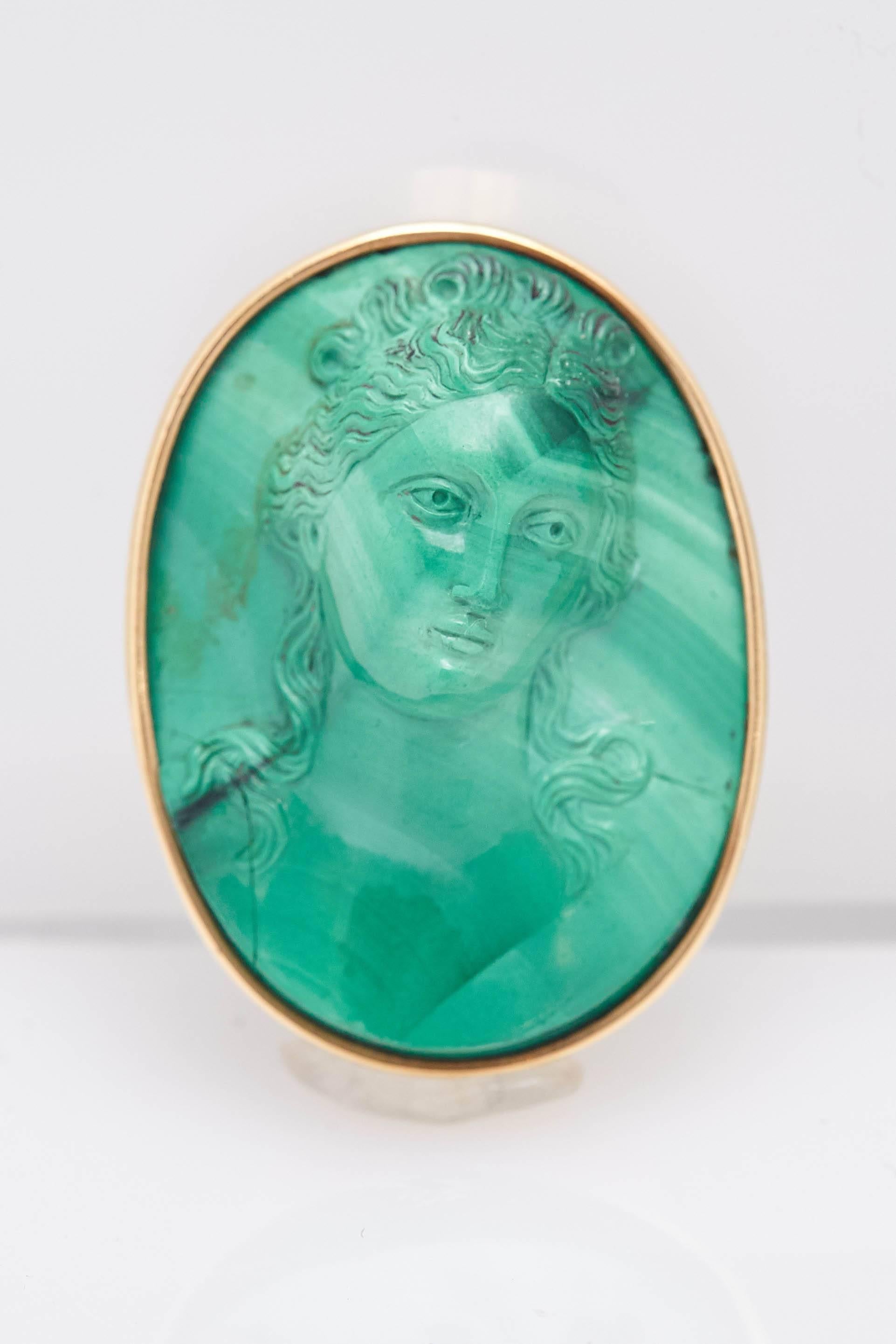 A pair of retro malachite cameo ear-clips, mounted on 18kt yellow gold. Made in Italy, circa 1950. 