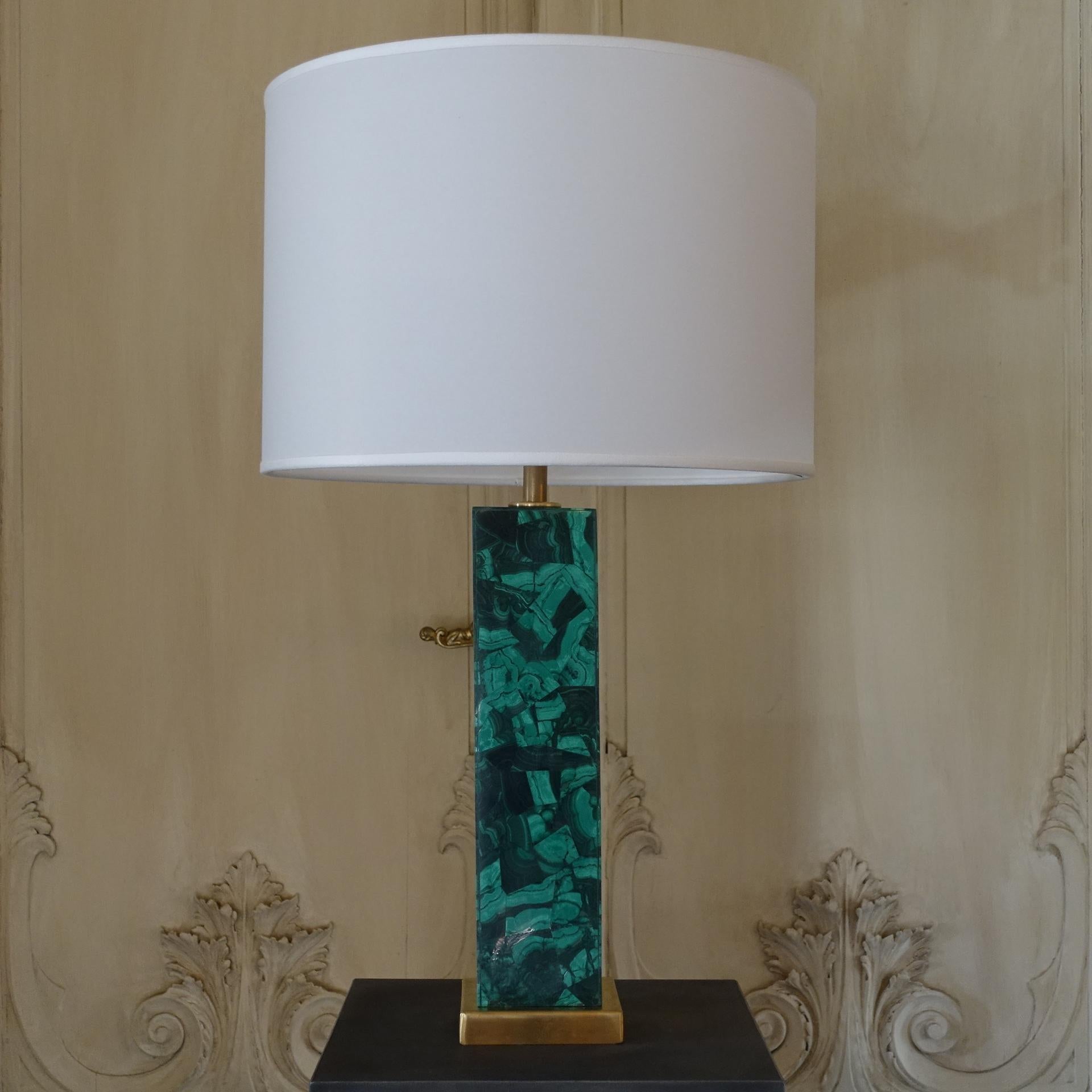 One of a kind table lamp in malachite with natural brass base, lampshade measures cm diameter 45 x height 30, total high cm 76, available the pair.