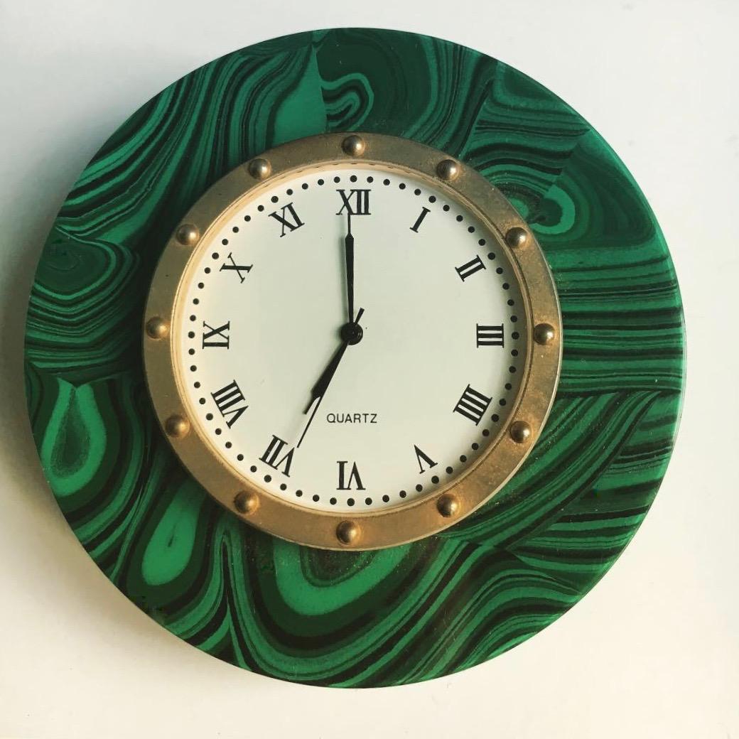Malachite desk clock with brass studded detailed face, inspired by Gucci or Hermes, this small clock is a large statement of luxury and sophistication.

Clock size: 2