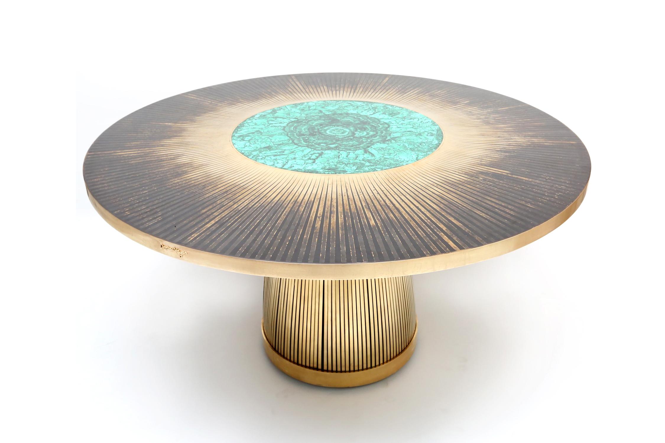 Malachite dining table sculpted by Yann Dessauvages
Signed
Dimensions: D 140 x H 75 cm 
Materials: Brass, resin, malachite

Yann Dessauvages °June 1989 born in Brussels is a Belgian autodidact artist-designer. As the child of a teacher and a