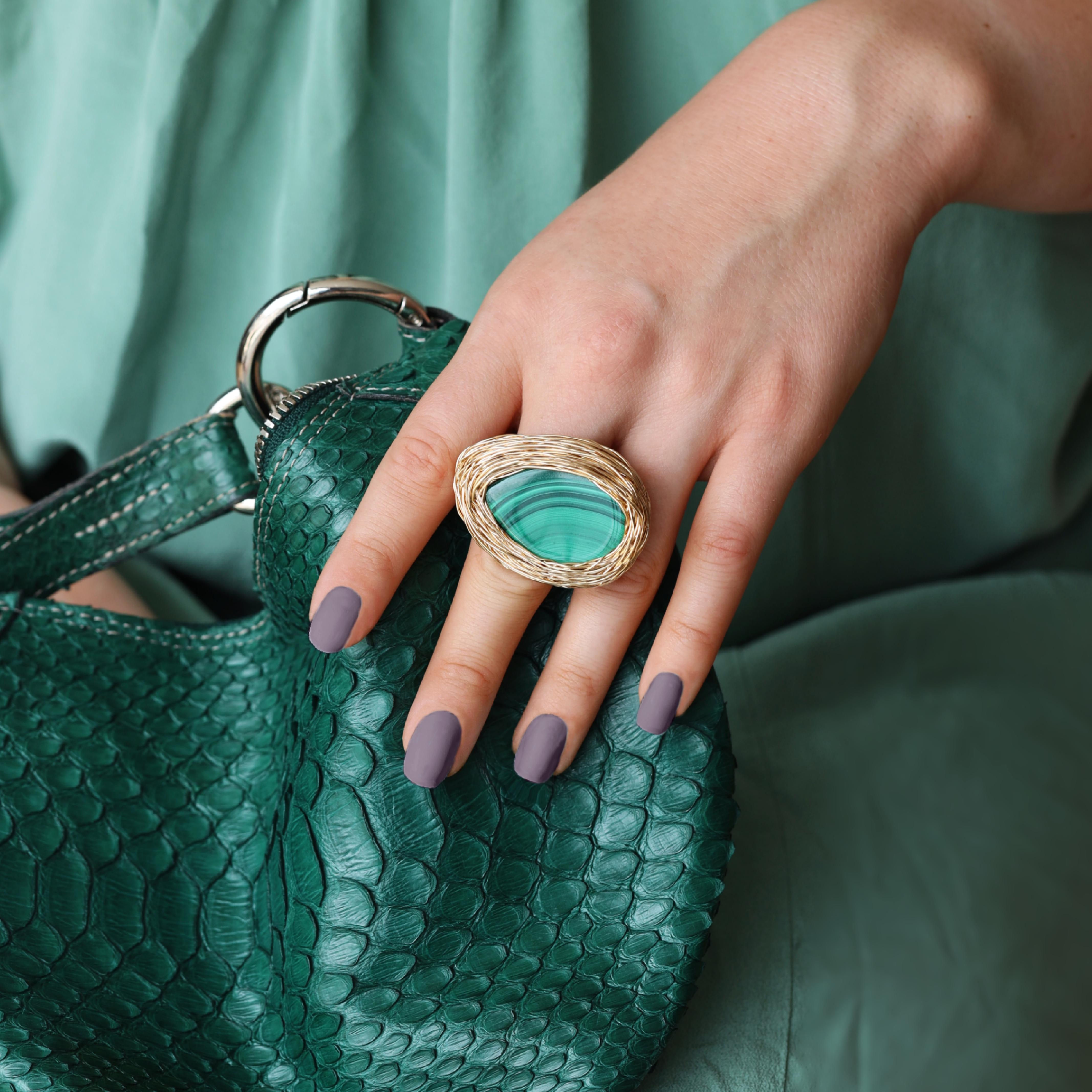‘Gwen’ … a beautiful shiny green malachite drop ring with a pure approach. She is simply the right kind of minimal cocktail ring.. and comes with character. The drop in itself is a classic shape and this kind of green colour is simply magical.