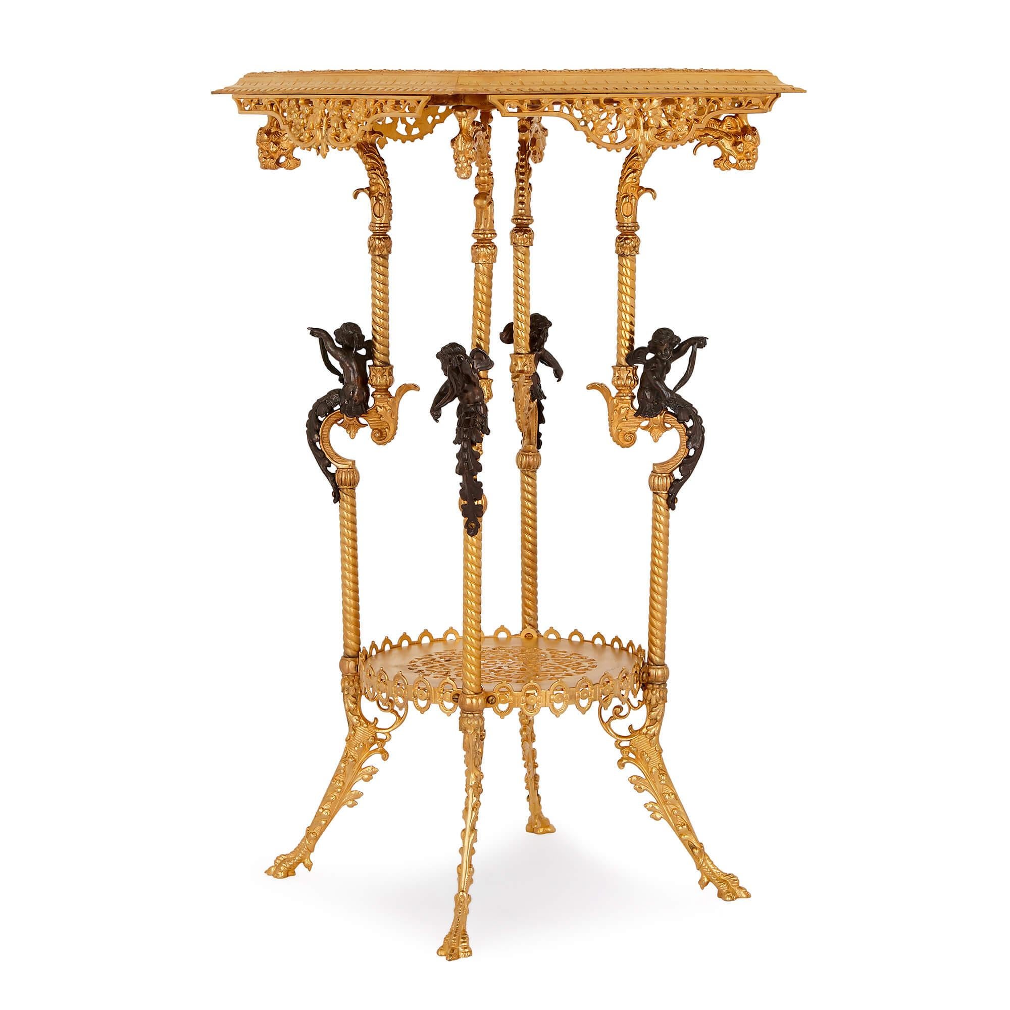 This exquisite table is composed of a malachite top supported on four gilt bronze legs, with a lower shelf. It was crafted in France in the early 20th century, and is an eclectic combination of classical and Chinoiserie stylistic features. 

Set