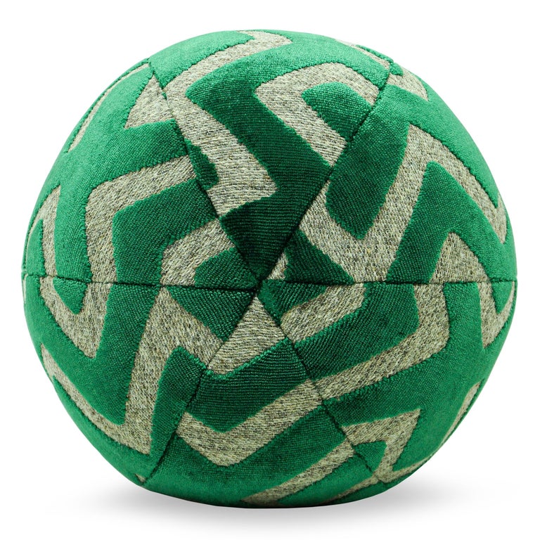 Fun tribal pattern Velvet fabric with a wool ground covers this ball pillow. Stuffed with a feather down blend. Ball can be made in any fabric. Ask for current availability of ball in fabric as shown. 

Measurements:
Overall: 12” W x 12” D x 12”