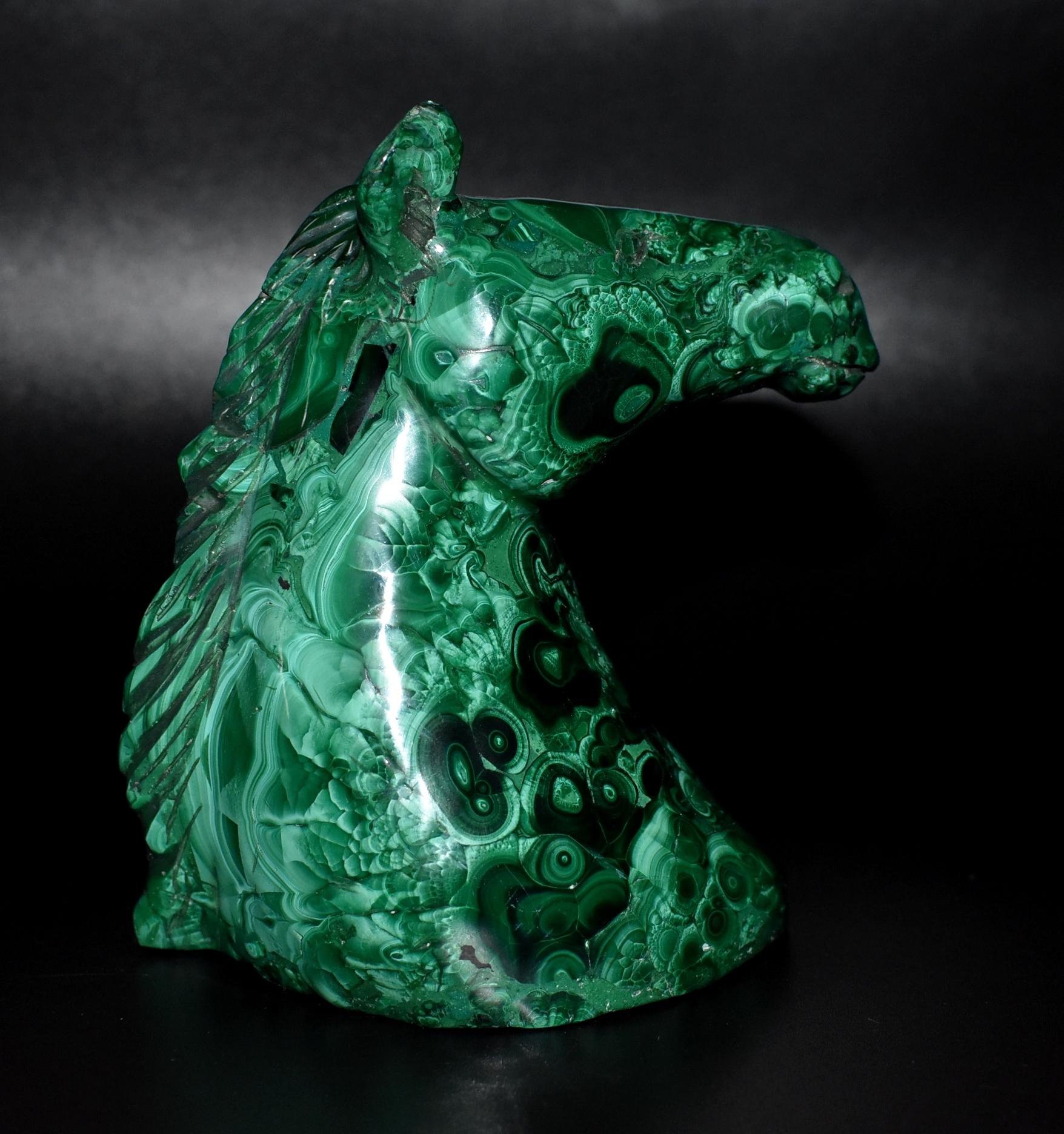 A wonderful 1.8 lb horse bust sculpture in spectacular natural malachite. This exceptional piece uses carefully selected fine grade AAA gemstone malachite in brilliant green, displaying bullseyes, concentric rings and swirls. Horse is finely crafted