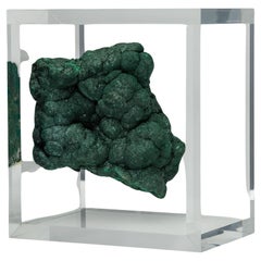 Malachite in free form mounted in original design acrylic base