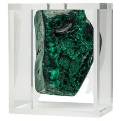 Malachite in free form mounted in original design acrylic base