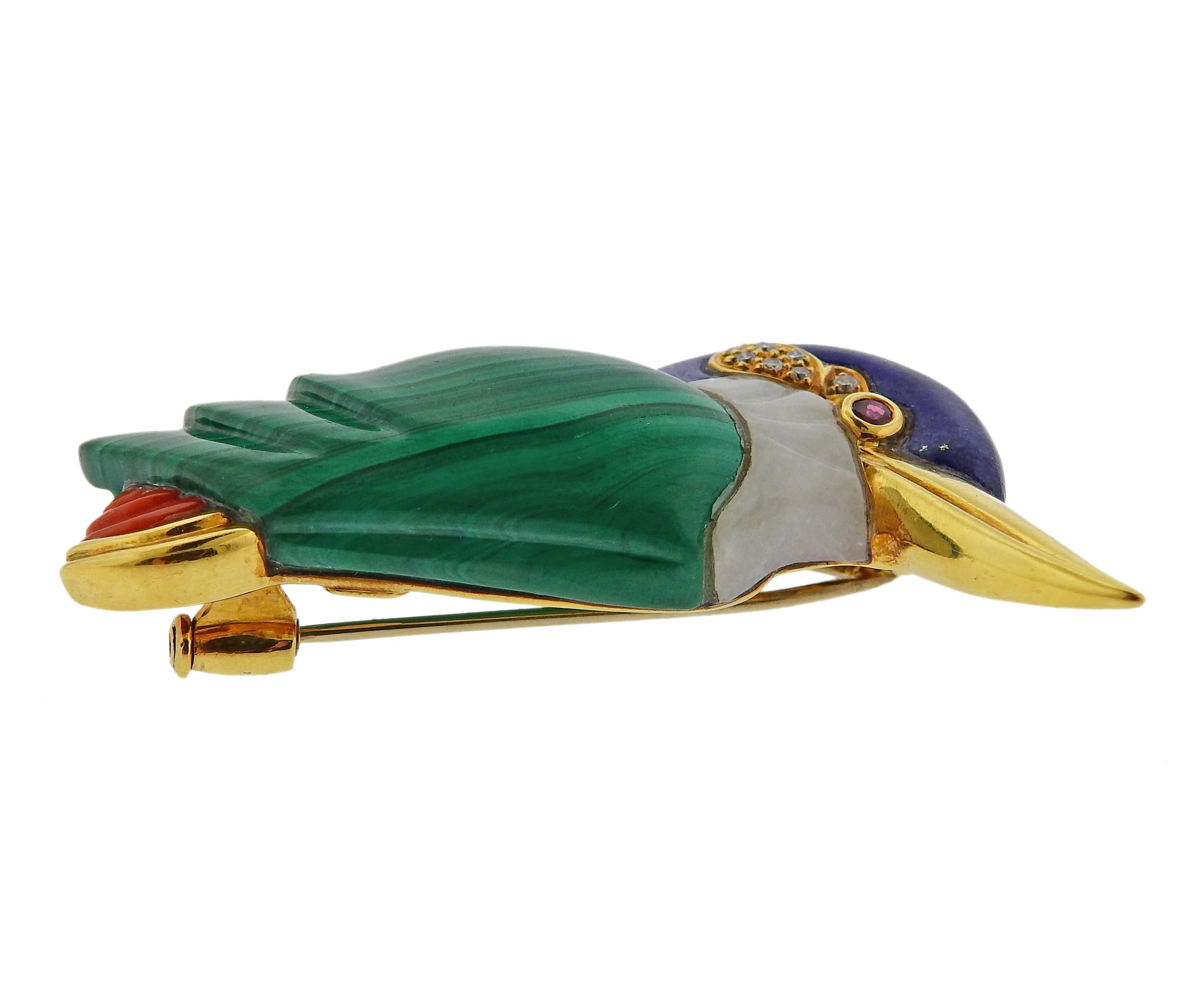 Colorful 18k gold bird brooch, set with lapis, malachite, white jade, coral, diamonds and ruby eye. The brooch measures 52mm x 25mm. Weight is 26.6 grams. 

SKU#PB-03020