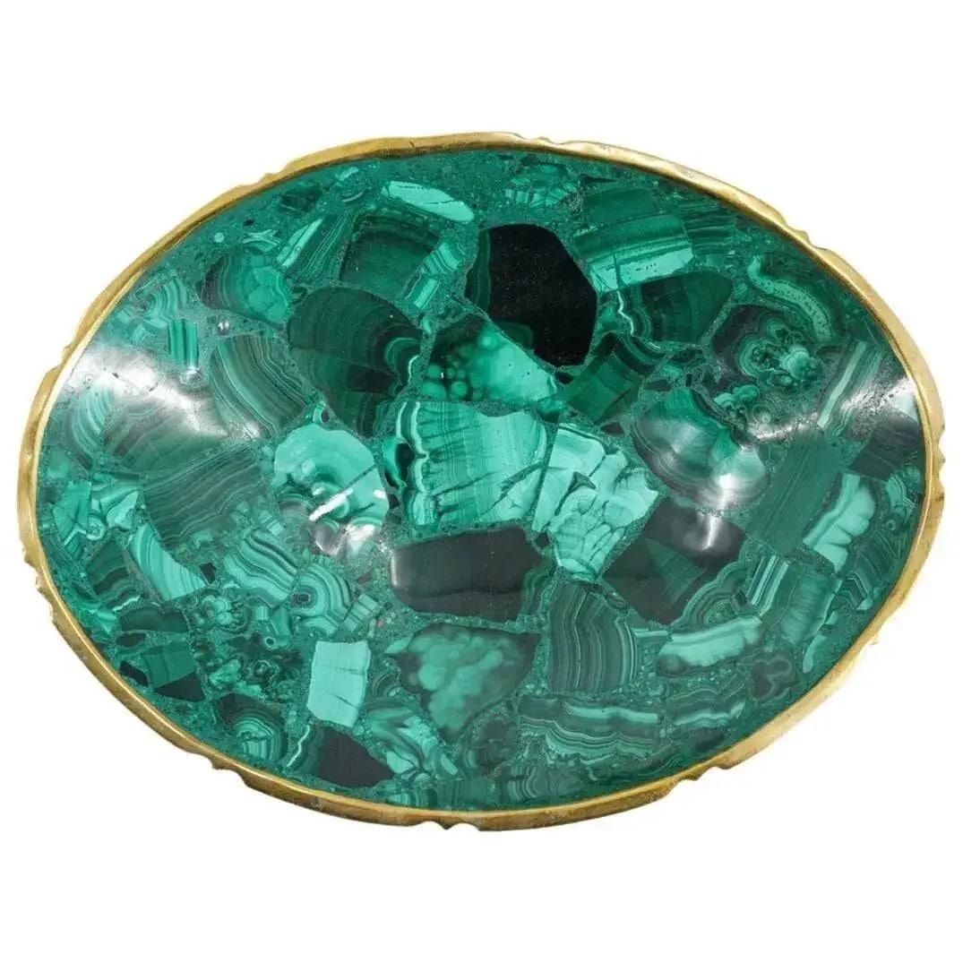 Gorgeous pair of brass mounted oval malachite catch-all trays or decorative bowls. The vintage videpoche (this listing is for both) are decorated with shaped gilt rims. The rich emerald hues are enhanced by the golden accents and add a luxurious