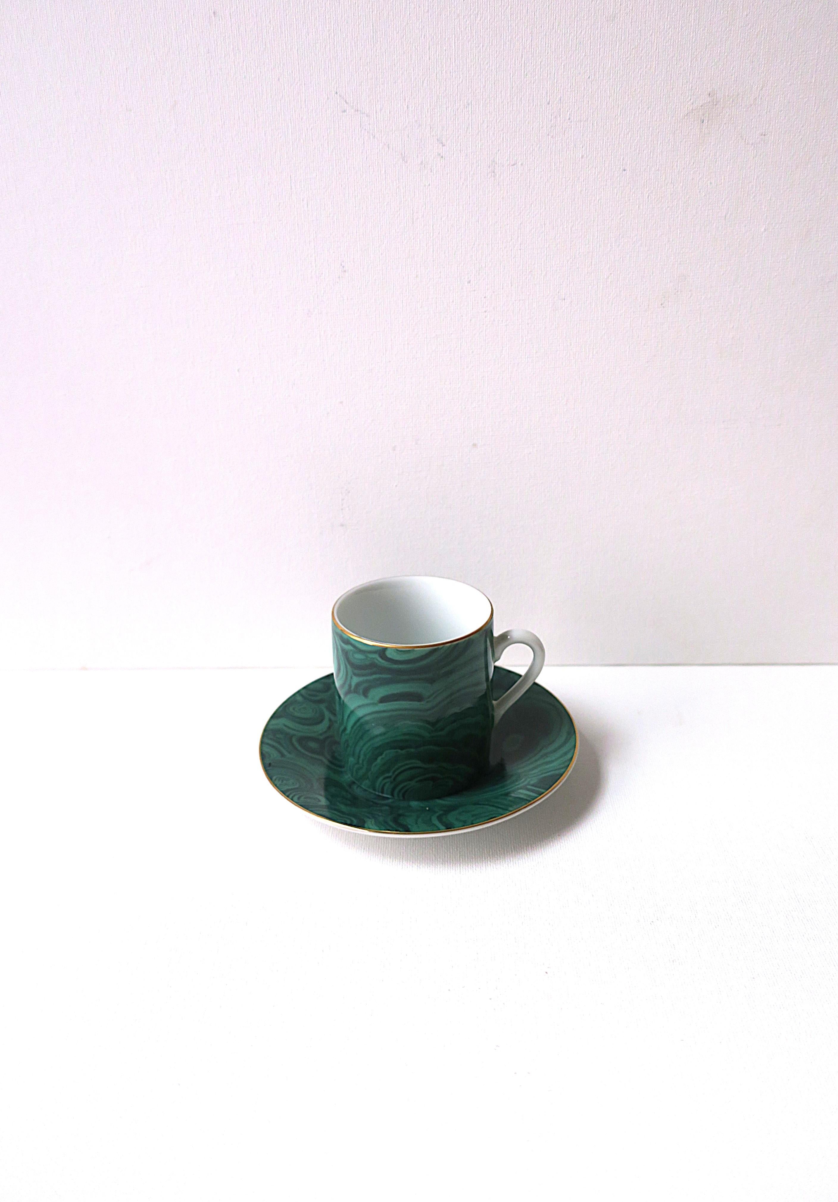 **Three (3) cup/saucer available, each sold individually, as per listing. 

A beautiful green malachite porcelain espresso coffee or tea demitasse cup and saucer, circa late-20th century, 1980s, '90s. Cup and saucer have a green faux-malachite