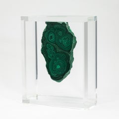 Malachite slab in free form mounted in original design acrylic base