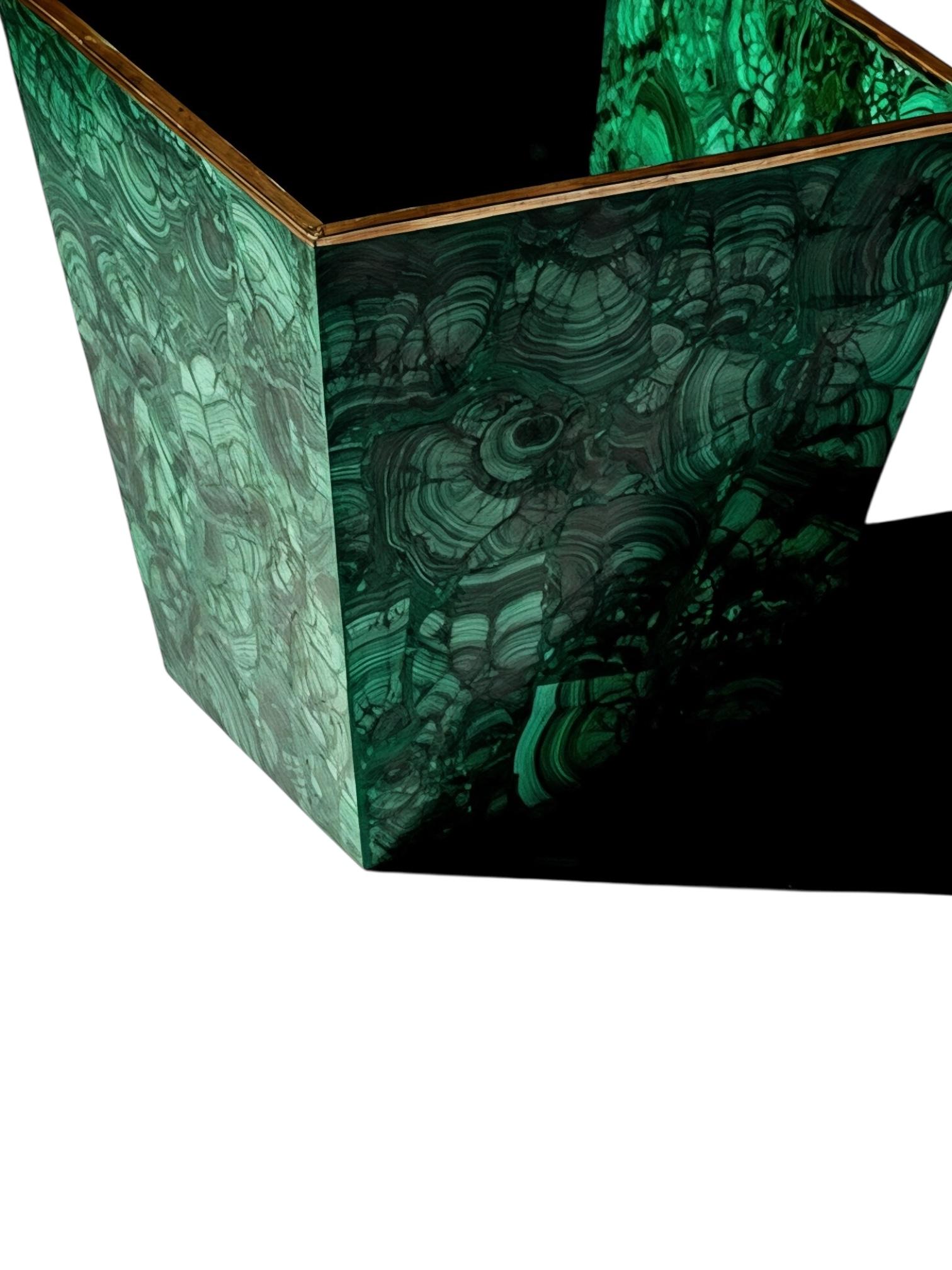 Add a touch of luxury and elegance to your space with this Malachite Square Planter. Crafted from exquisite malachite, this planter showcase the stone’s signature rich green hues and mesmerizing natural patterns, making it a striking statement piece