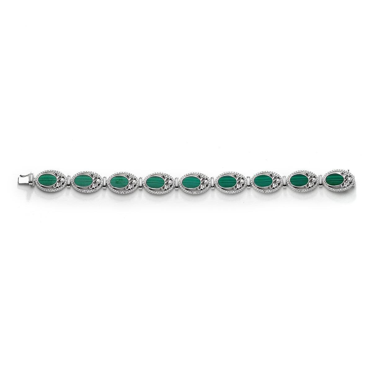 Bracelet in 18kt white gold set with 351 diamonds 2.13 cts and 9 malachites 17.02 ct