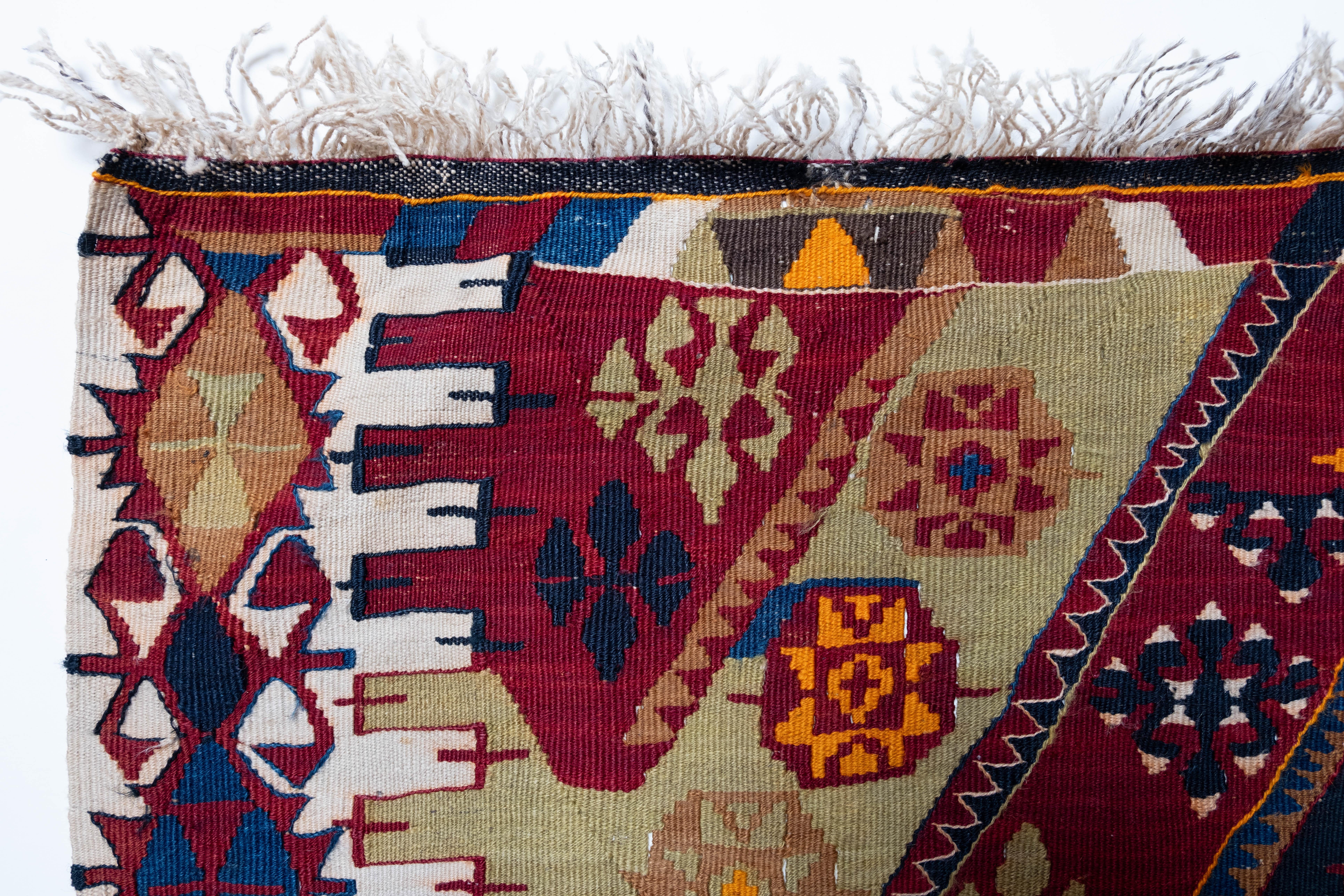 This is Eastern Anatolian Old, Vintage Kilim from the Malatya region with a rare and beautiful color composition.

This highly collectible antique kilim has wonderful special colors and textures that are typical of an old kilim in good condition. It